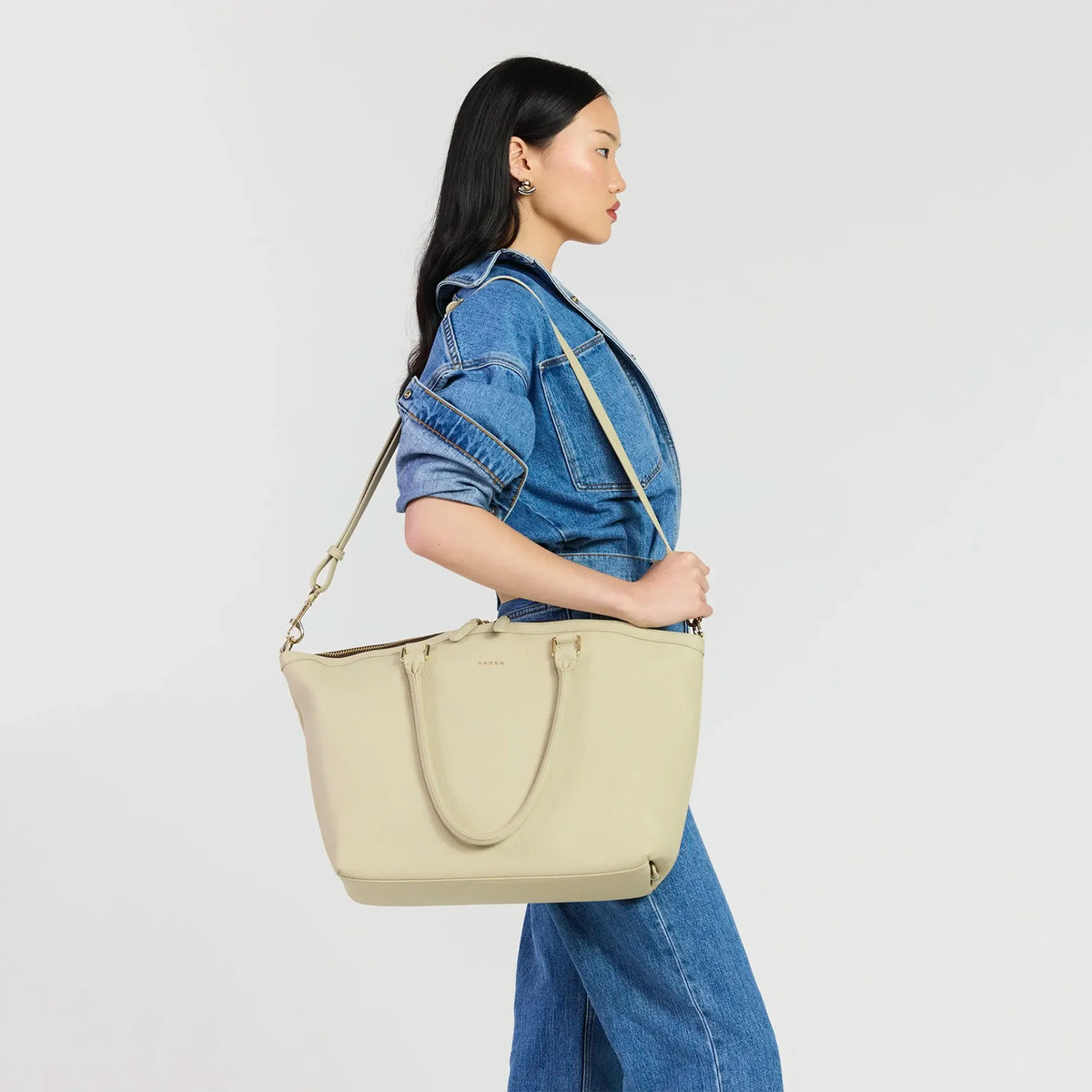 Saben Milan Carry-All Bag - Oyster worn on the shoulder with the long strap