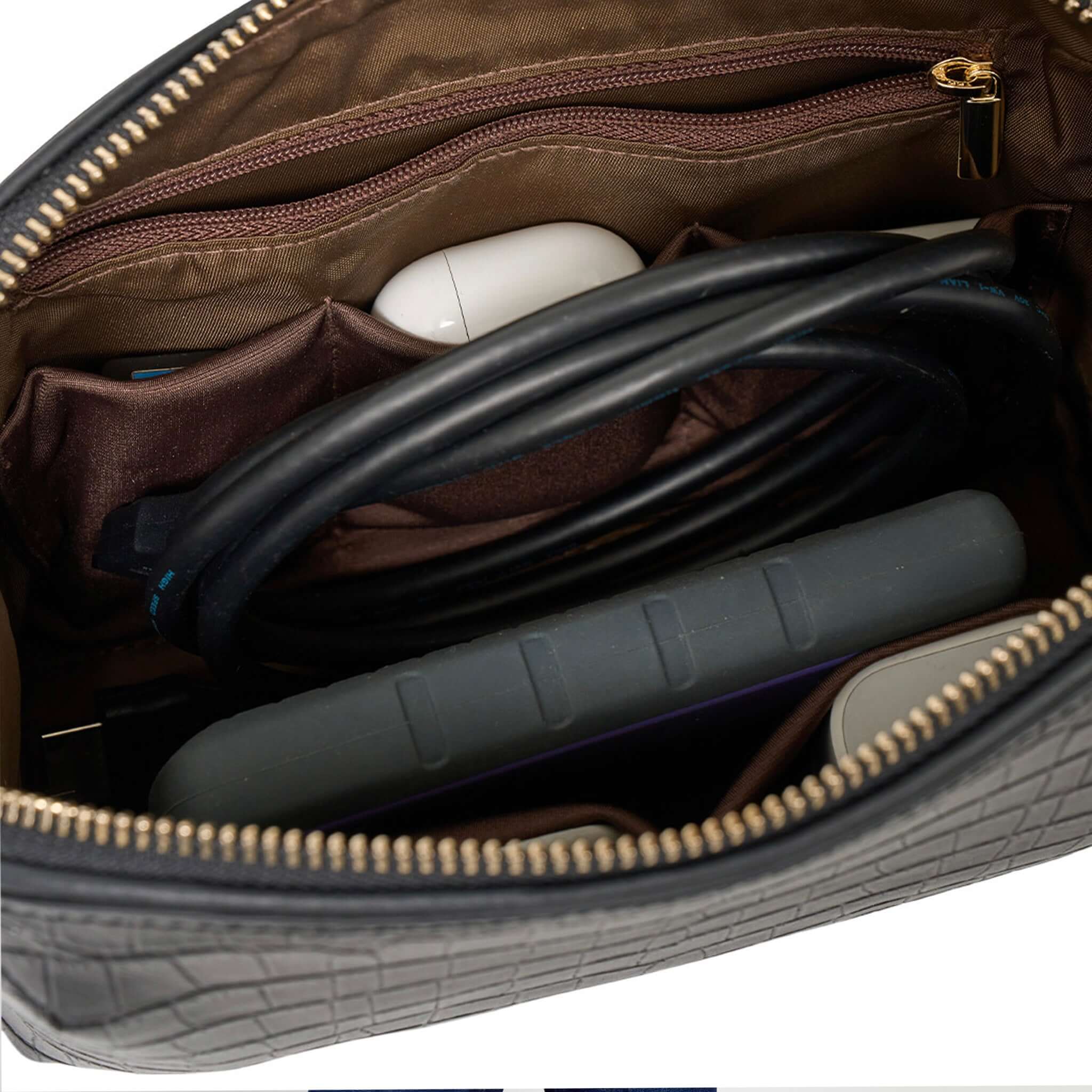 Alt Tag: Saben Tate Tech / Cosmetic Pouch - Espresso Croc open interior with zip pocket holding chargers, cables and daily essentials