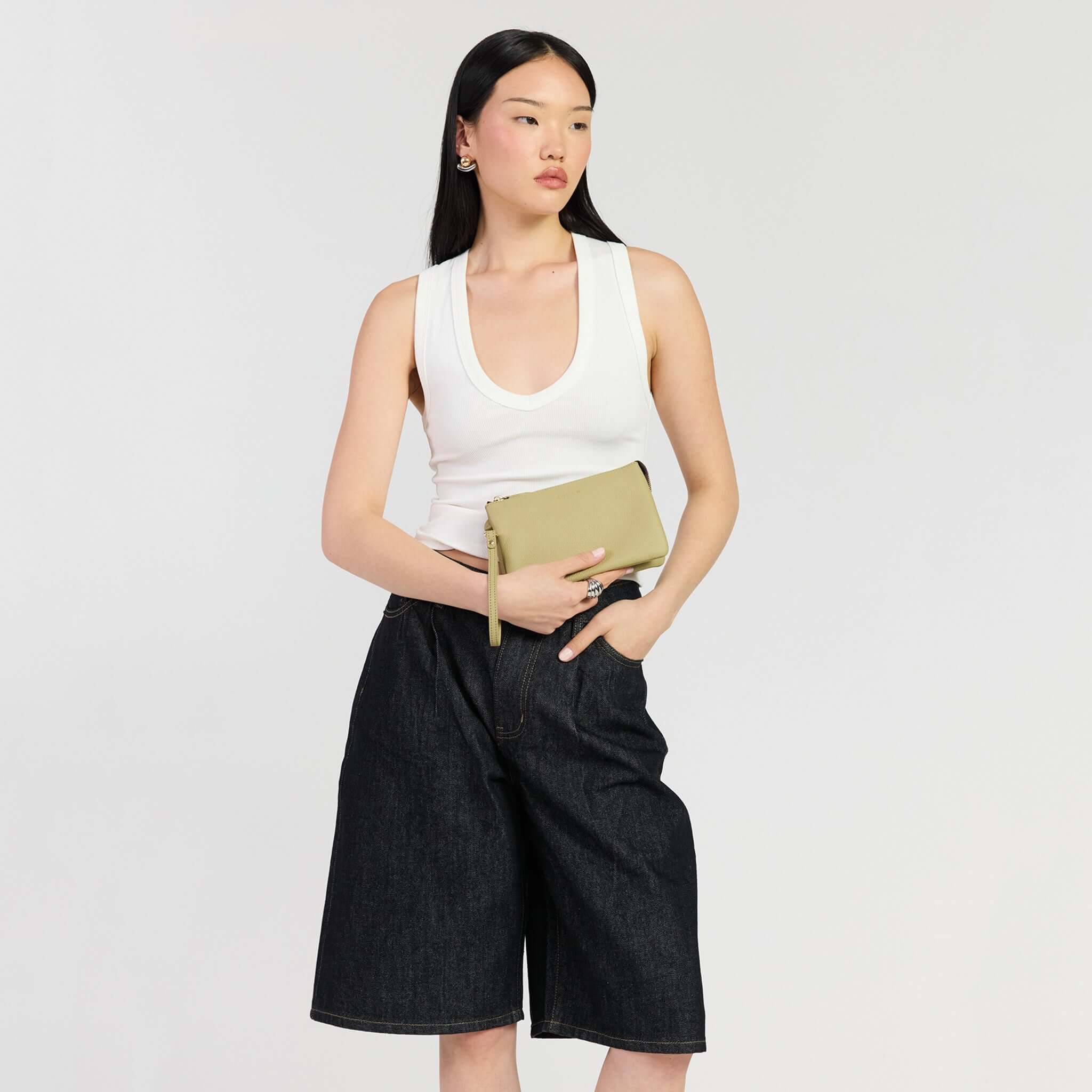 Model showcasing the Saben Tilly Crossbody Bag - Willow in a stylish outfit, ready for a day out.