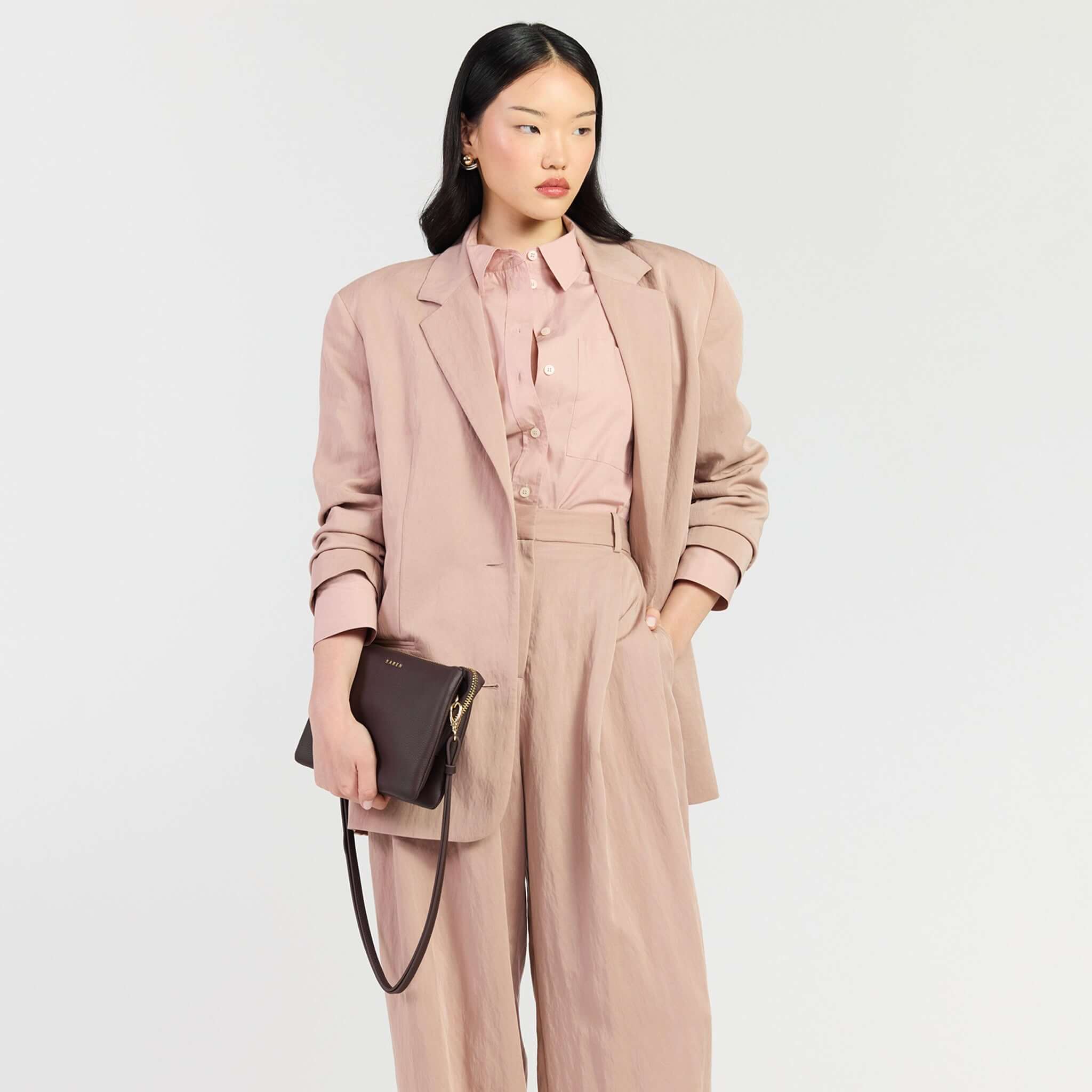 Model showcasing Saben Tilly's Big Sis Crossbody Bag - Cacao with chic outfit and stylish accessories.