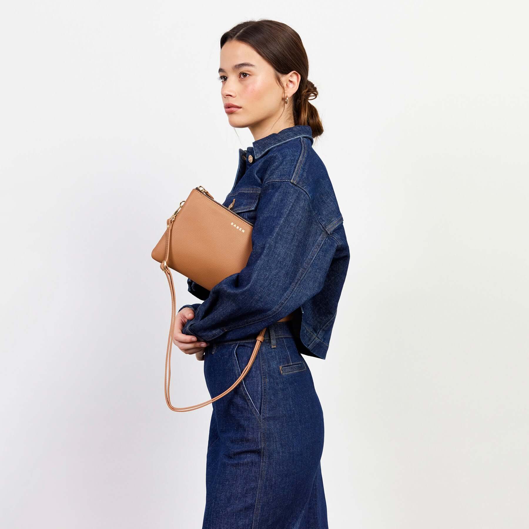 Alt Tag: Saben Tilly's Big Sis Crossbody Bag - Toffee pebbled leather crossbody on model, roomy organiser clutch with adjustable strap