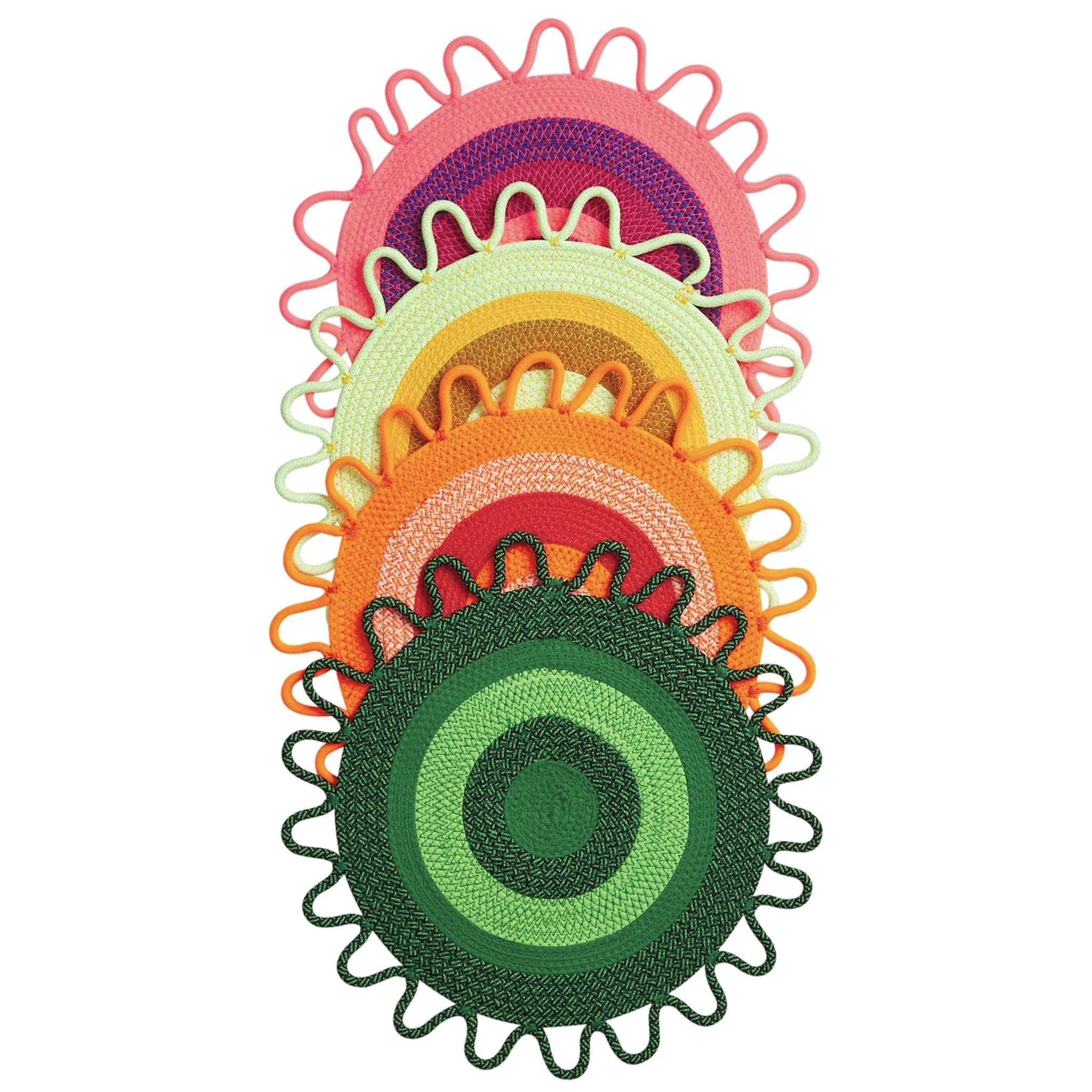 Colorful circular placemats with decorative edges on a white background