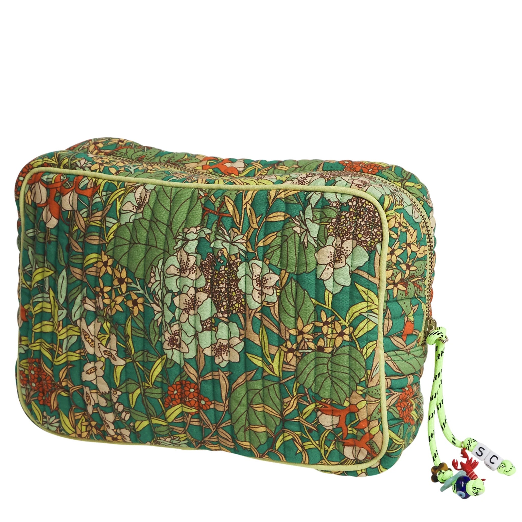 Floral patterned cosmetic bag with a strap on a white background