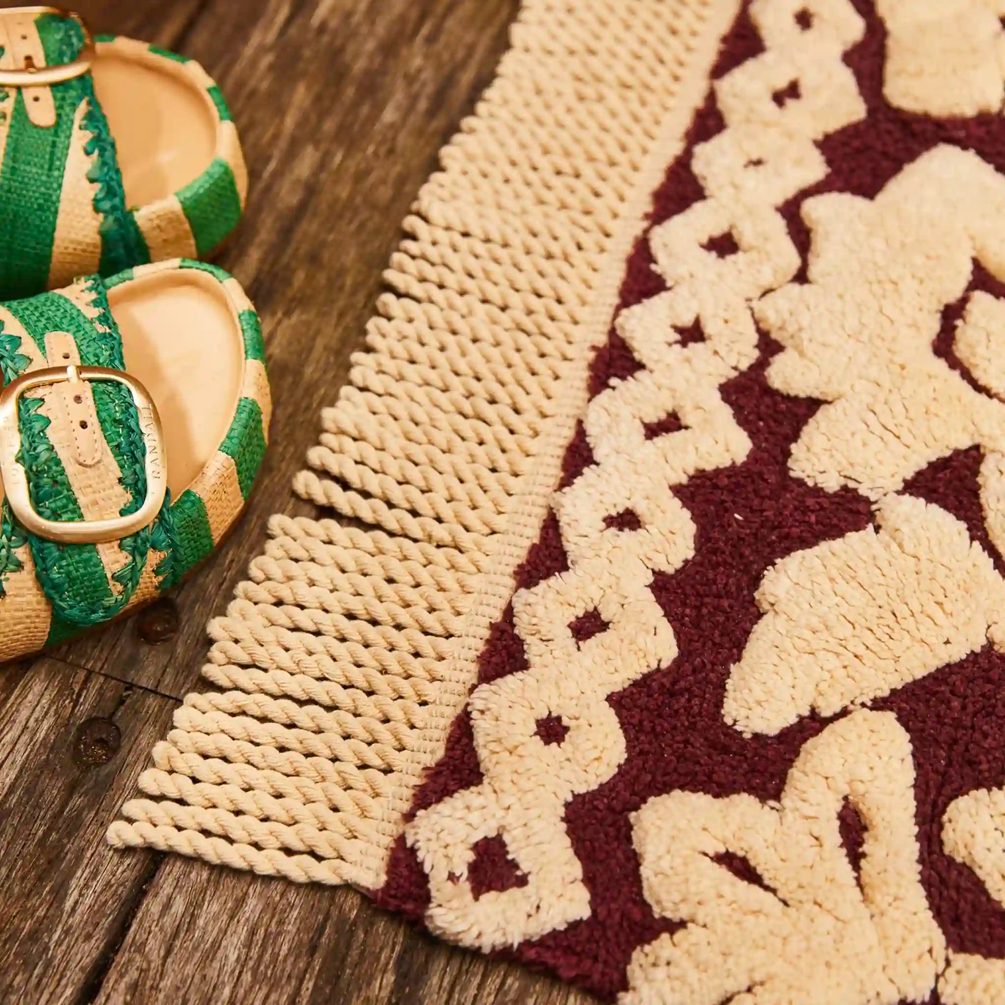 Bath mat with geometric pattern on a wooden surface