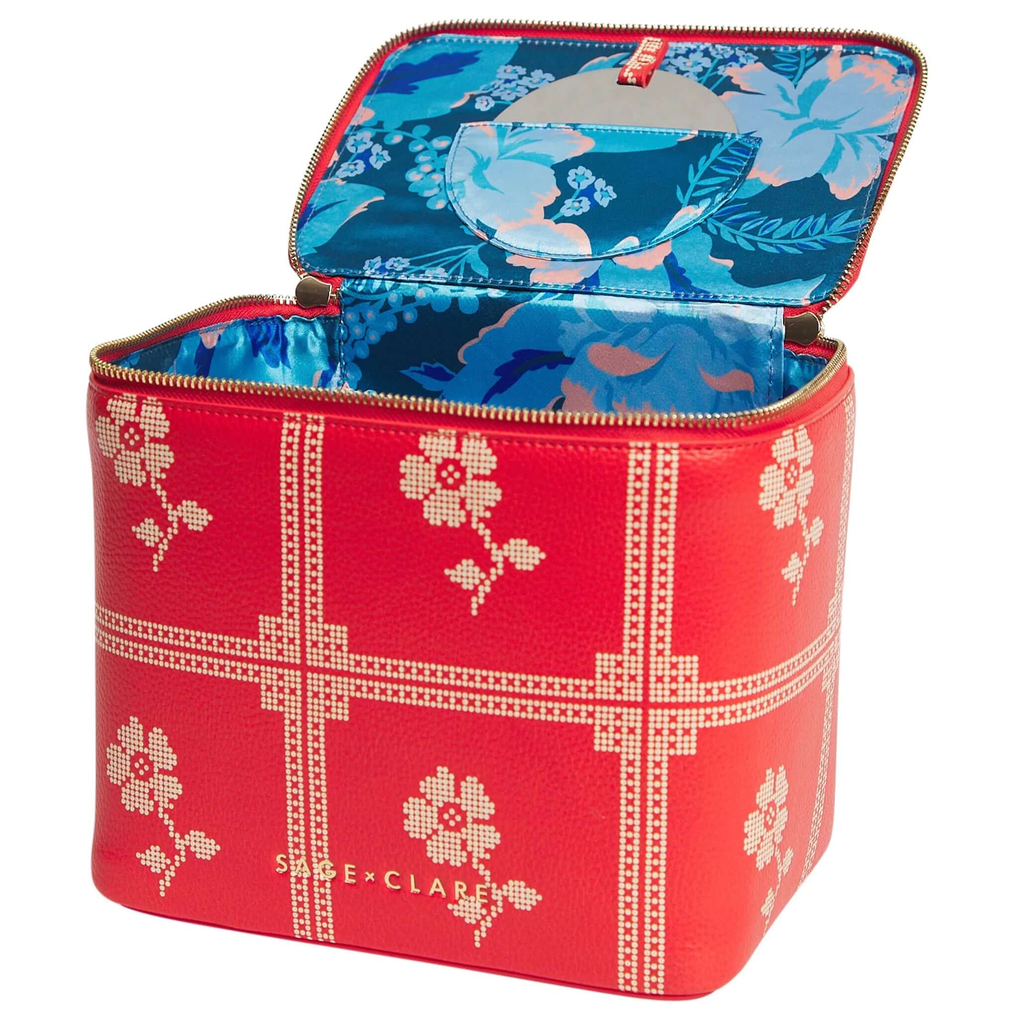 Sage x Clare Bonny Medium Vanity Case - Poppy open to reveal vibrant blue floral interior with gold zip.
