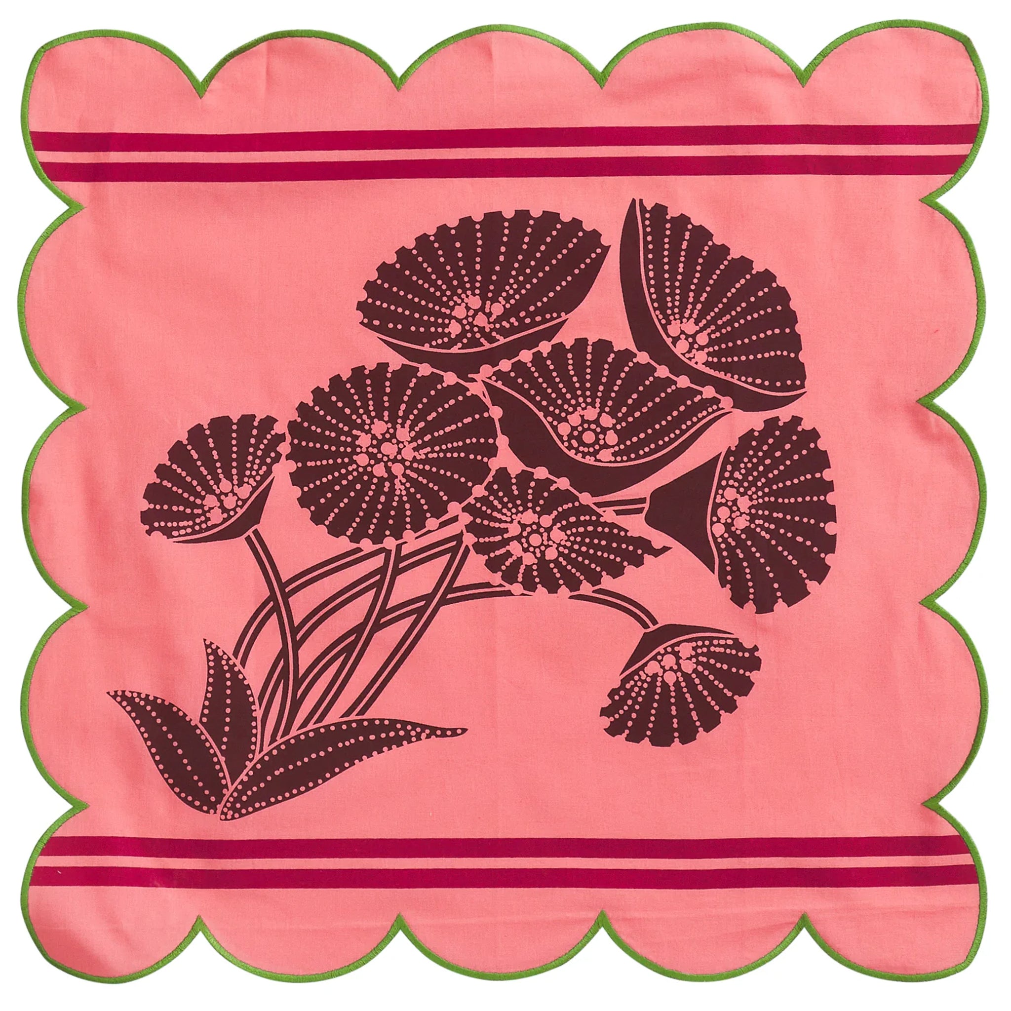 Decorative pink napkin with black floral pattern and scalloped edges