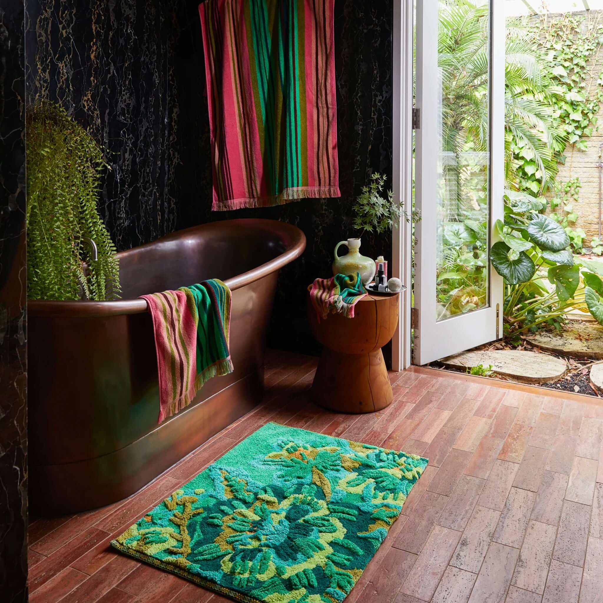 Alt Tag: Sage x Clare Eliza Bath Mat - Spring Green organic cotton floral bath mat in vibrant green tones, plush and absorbent bathroom decor