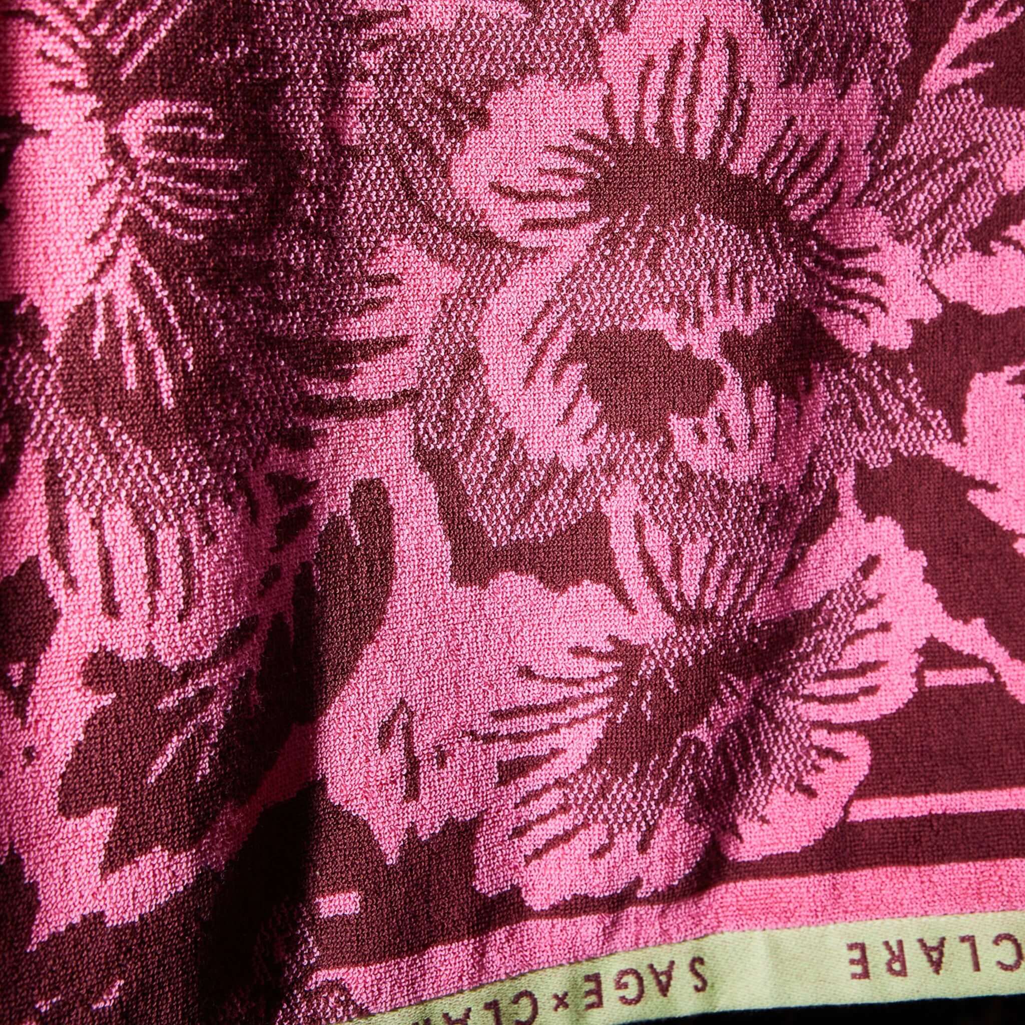 Alt Tag: Sage x Clare Eliza Bath Sheet - Primrose close-up of bold floral terry towel pattern with signature Sage x Clare border