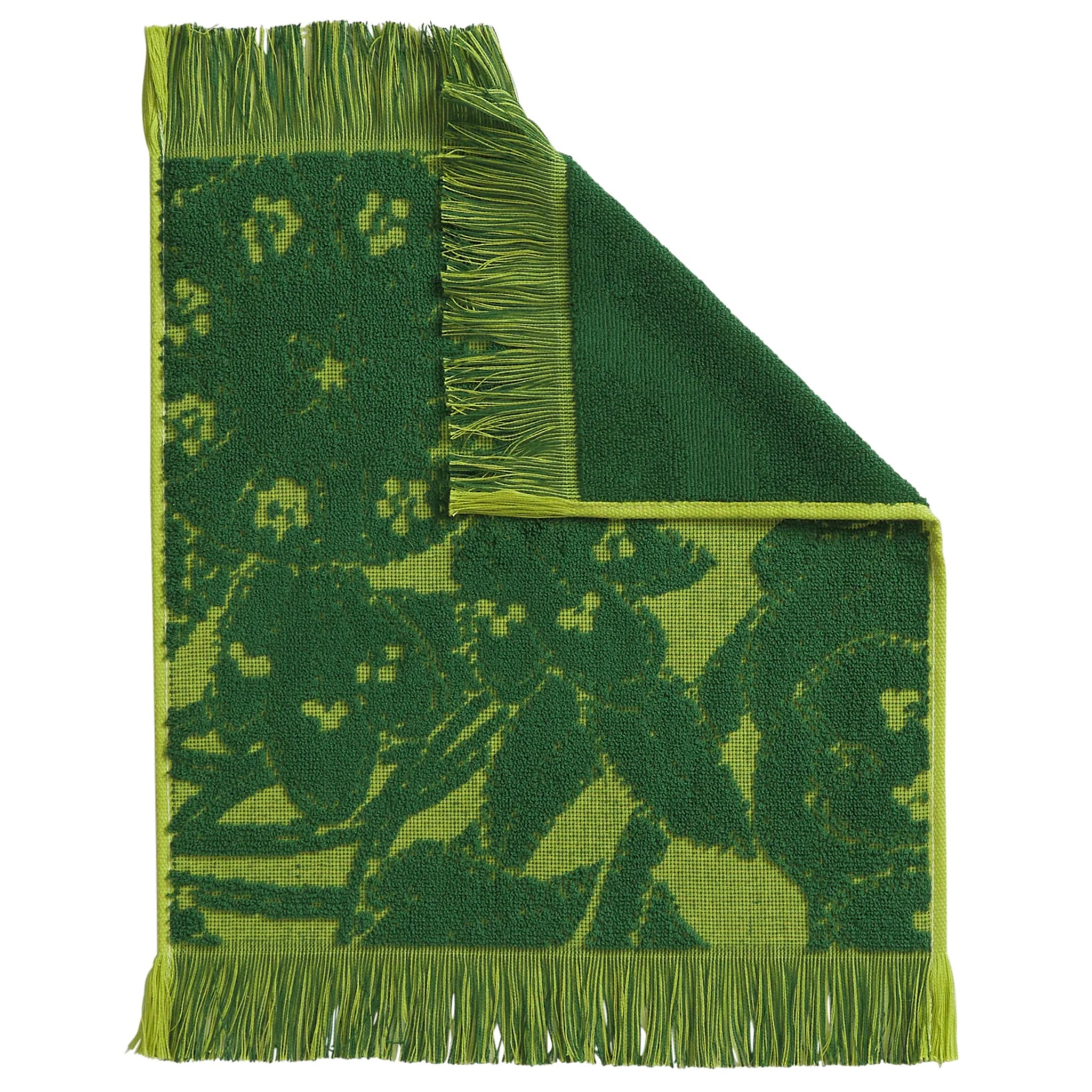 Green woven wash cloth with floral pattern on a white background