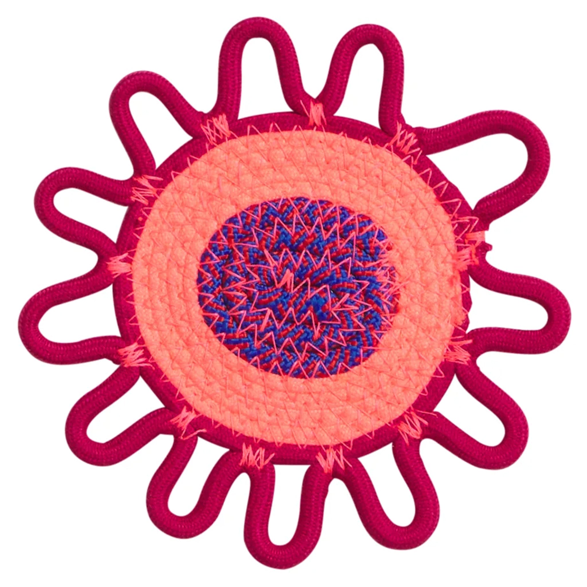 Sun-shaped coaster with red border and pink center on a white background