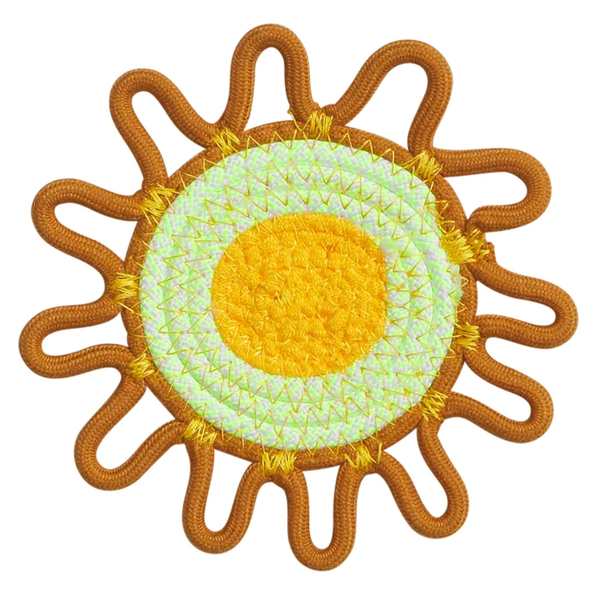 Sun-shaped coaster with gold border and yellow center on a white background