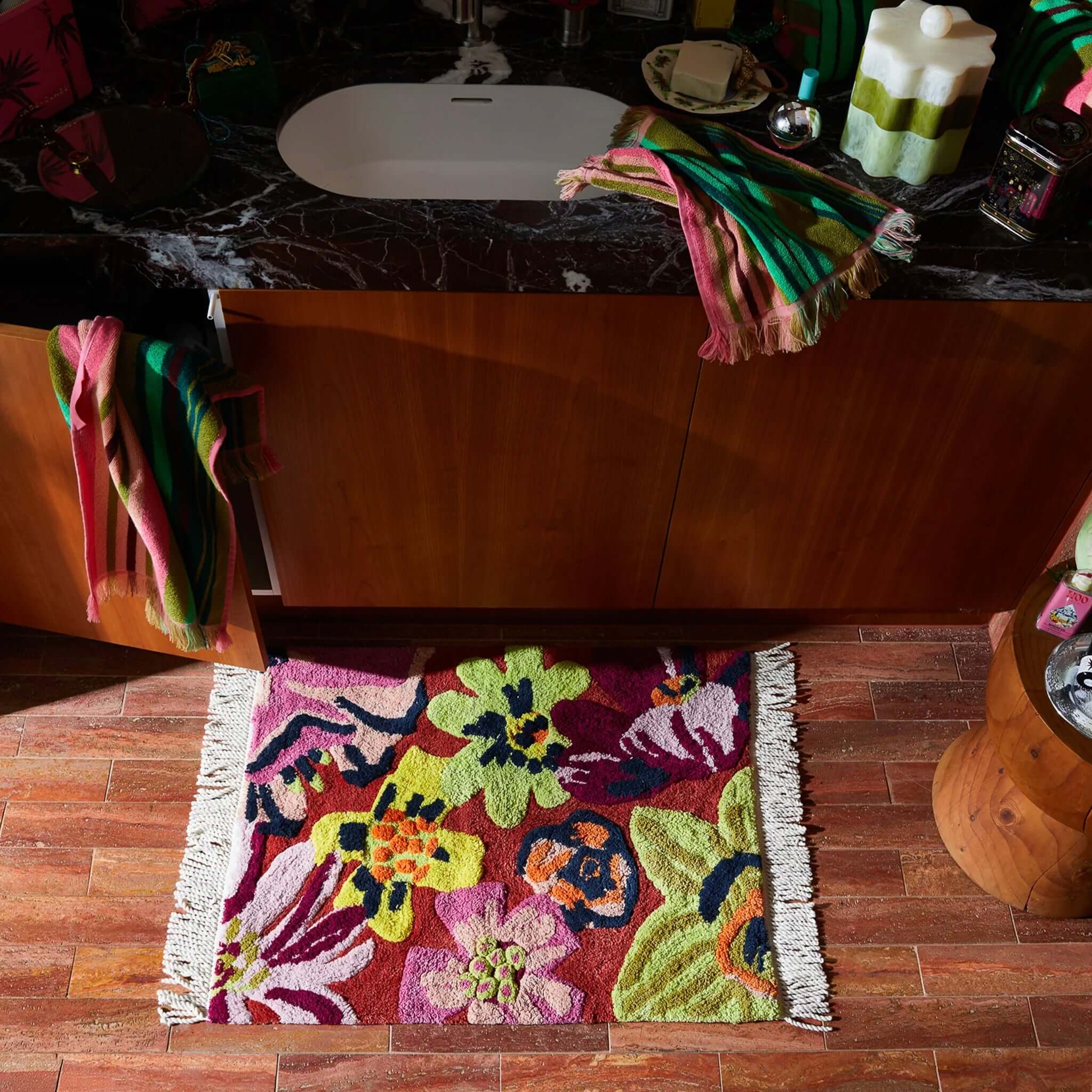 Alt Tag: Sage x Clare Ines Bath Mat colourful floral organic cotton bath mat with fringed edges in modern bathroom