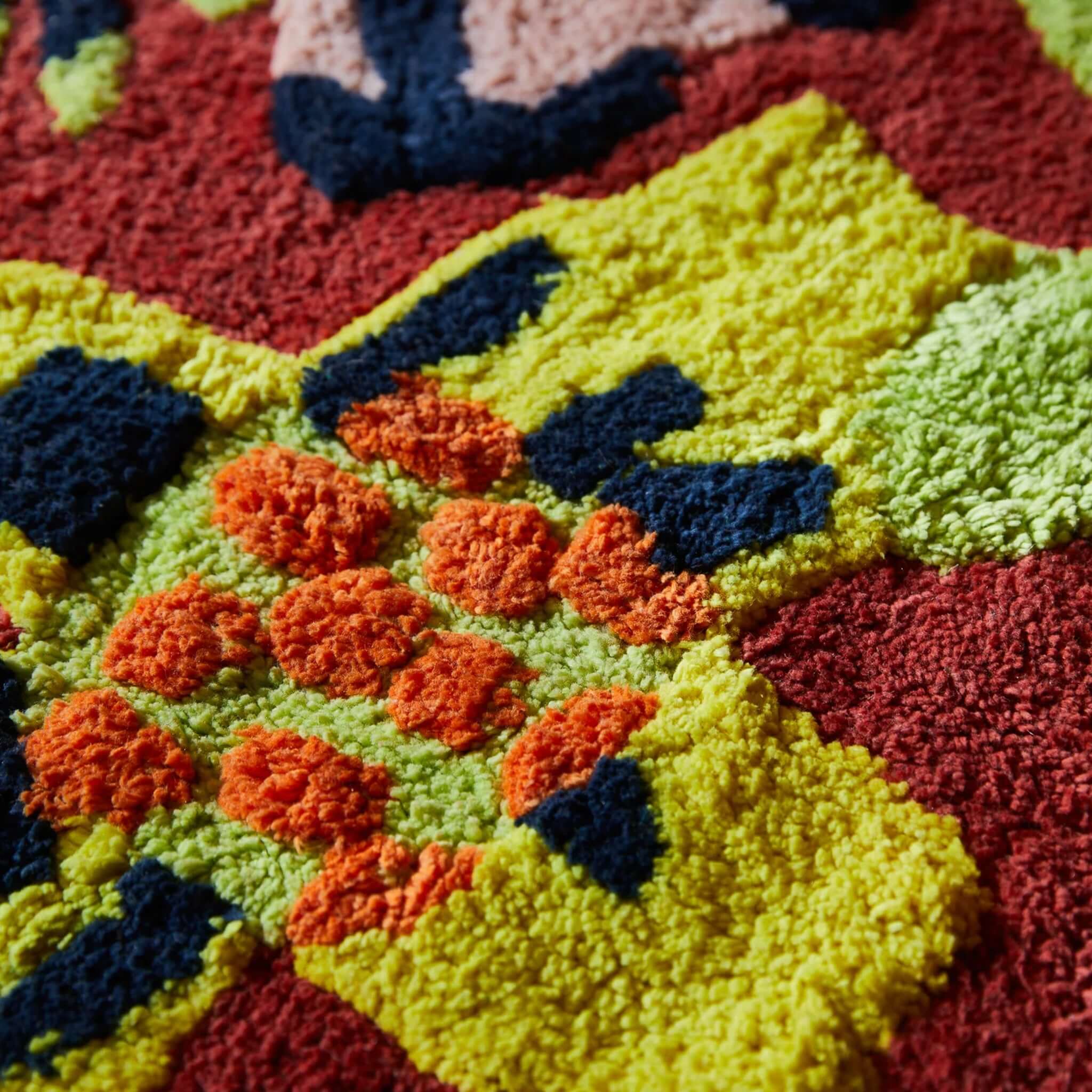 Alt Tag: Sage x Clare Ines Bath Mat close-up of plush organic cotton bath mat with bold colourful floral pattern and absorbent texture
