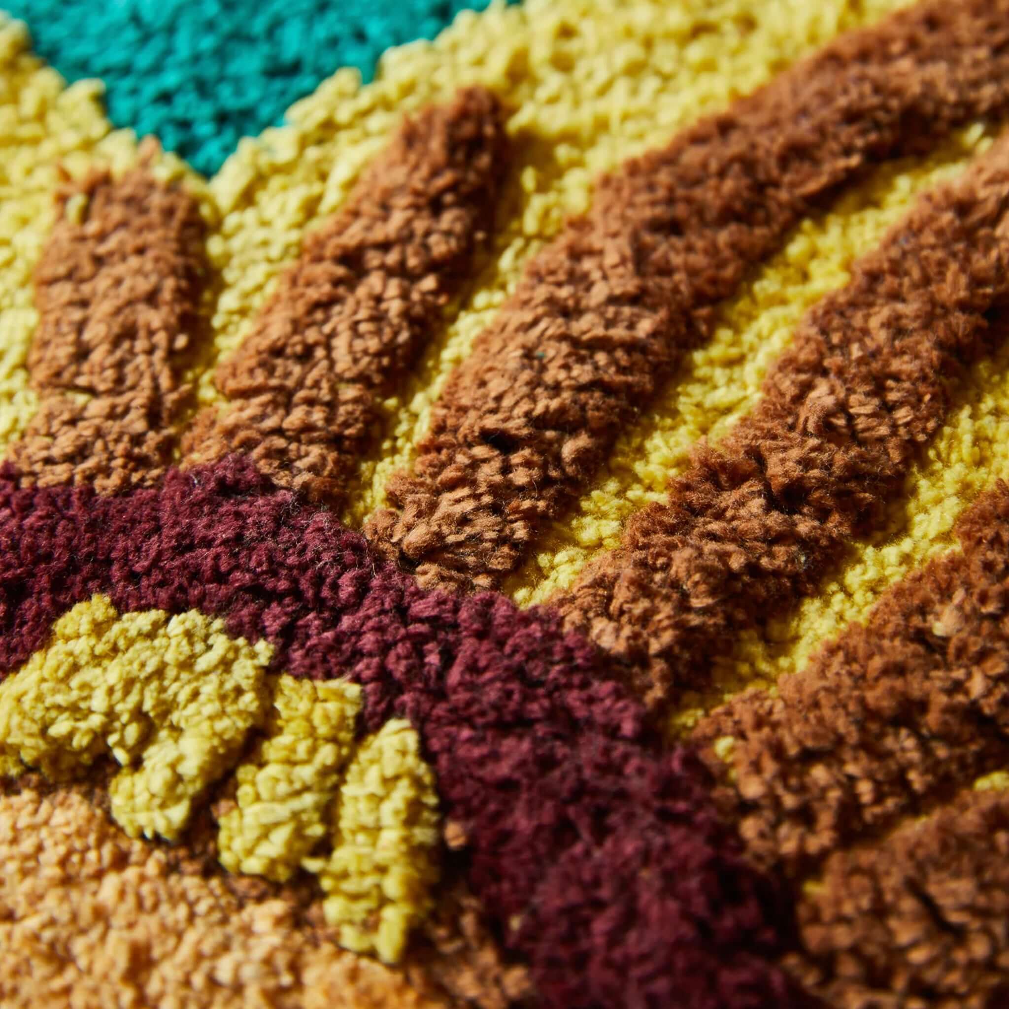 Alt Tag: Sage x Clare Ines Bath Runner close-up of plush organic cotton bath mat with bold floral tufting in teal, mustard and burgundy