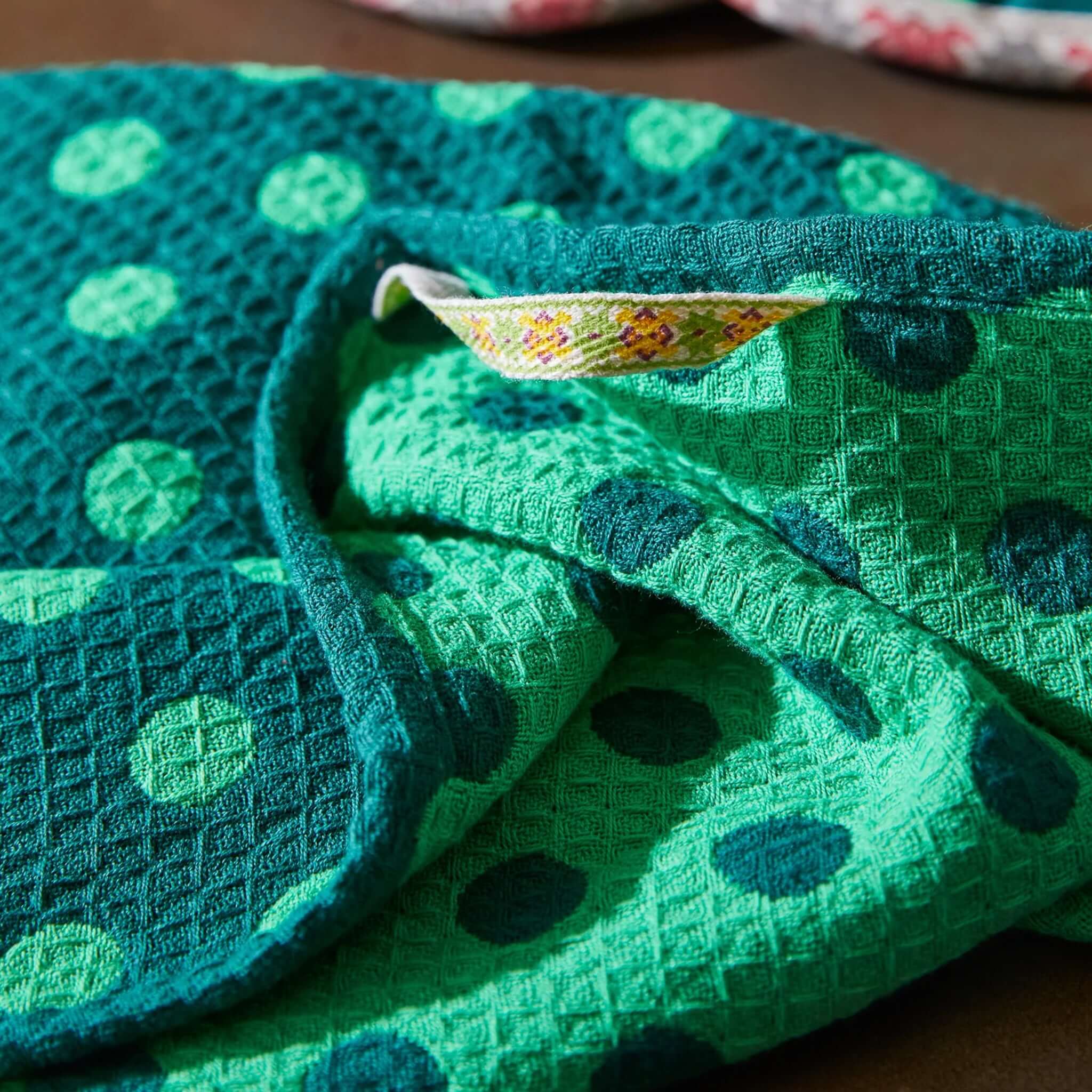 Alt Tag: Sage x Clare Paige Organic Cotton Tea Towel - Verdant green waffle weave tea towel with playful spot design, soft and absorbent