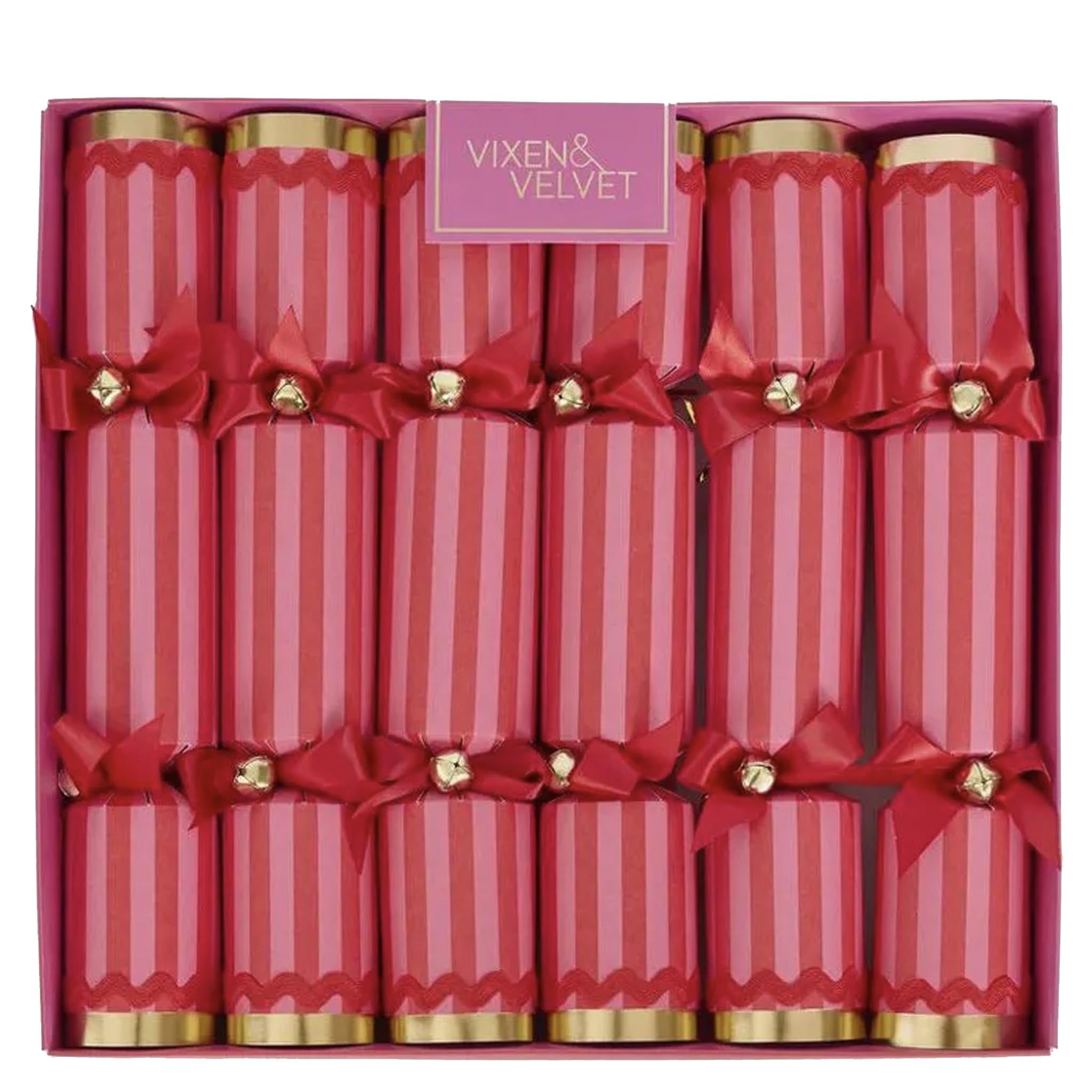Red striped crackers with gold accents in a box labeled 'Vixen & Velvet'.
