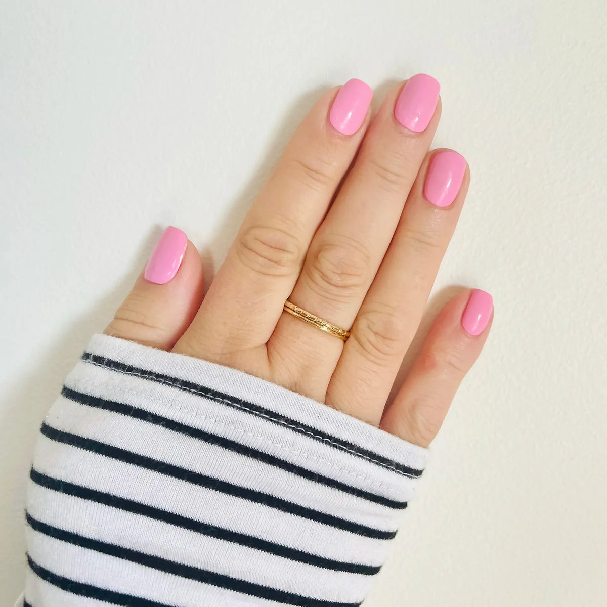 Selfie Nails Express Gel Polish Strips Candy Pink worn as a glossy pink manicure