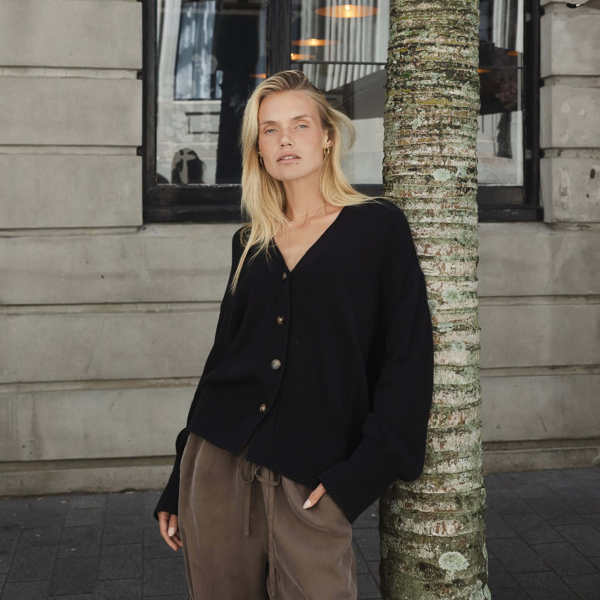 Alt Tag: Sophie Love Me Cotton & Cashmere Cardigan - Ash worn oversized by model with button front, cosy layering cardigan