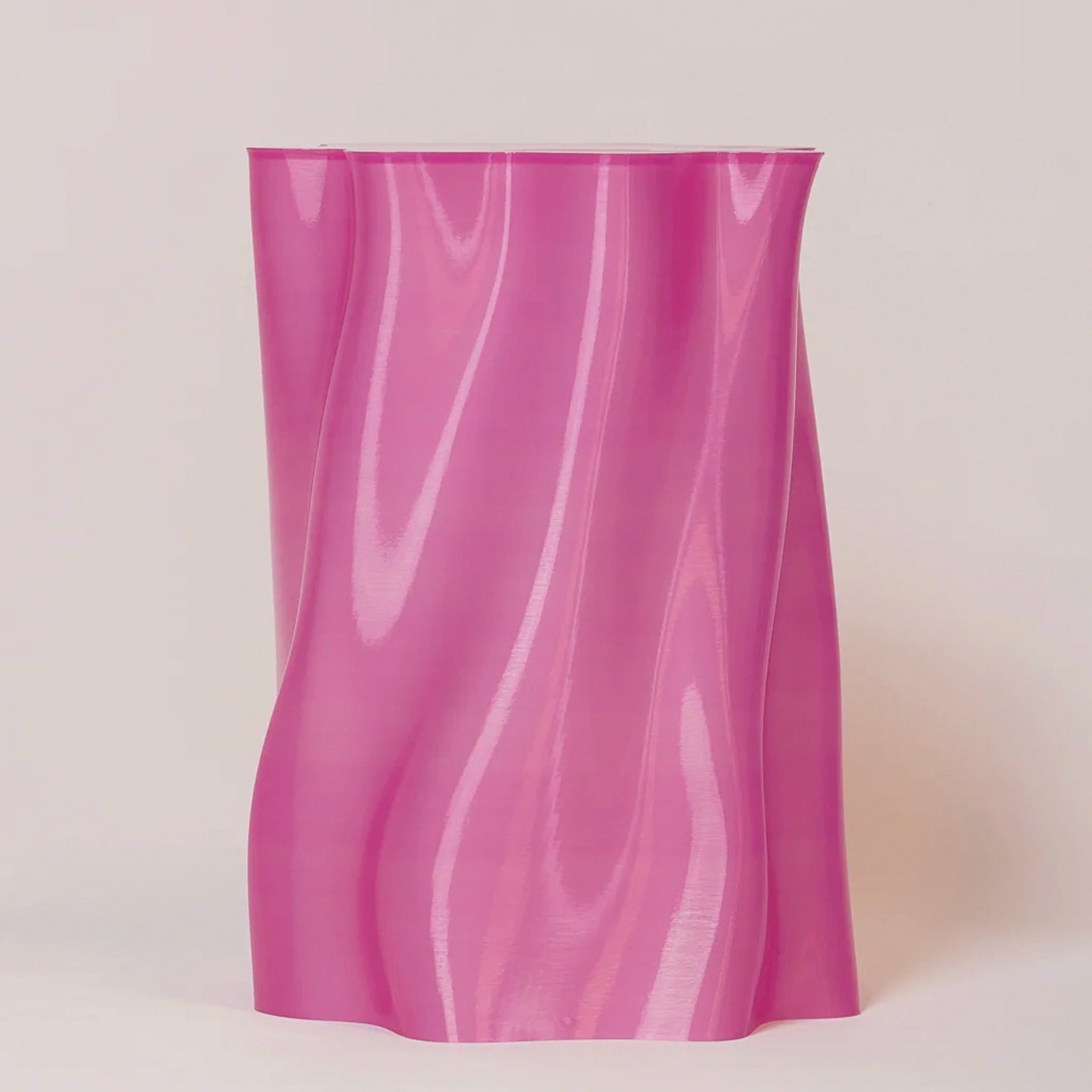 Pink wavy stool on a white background