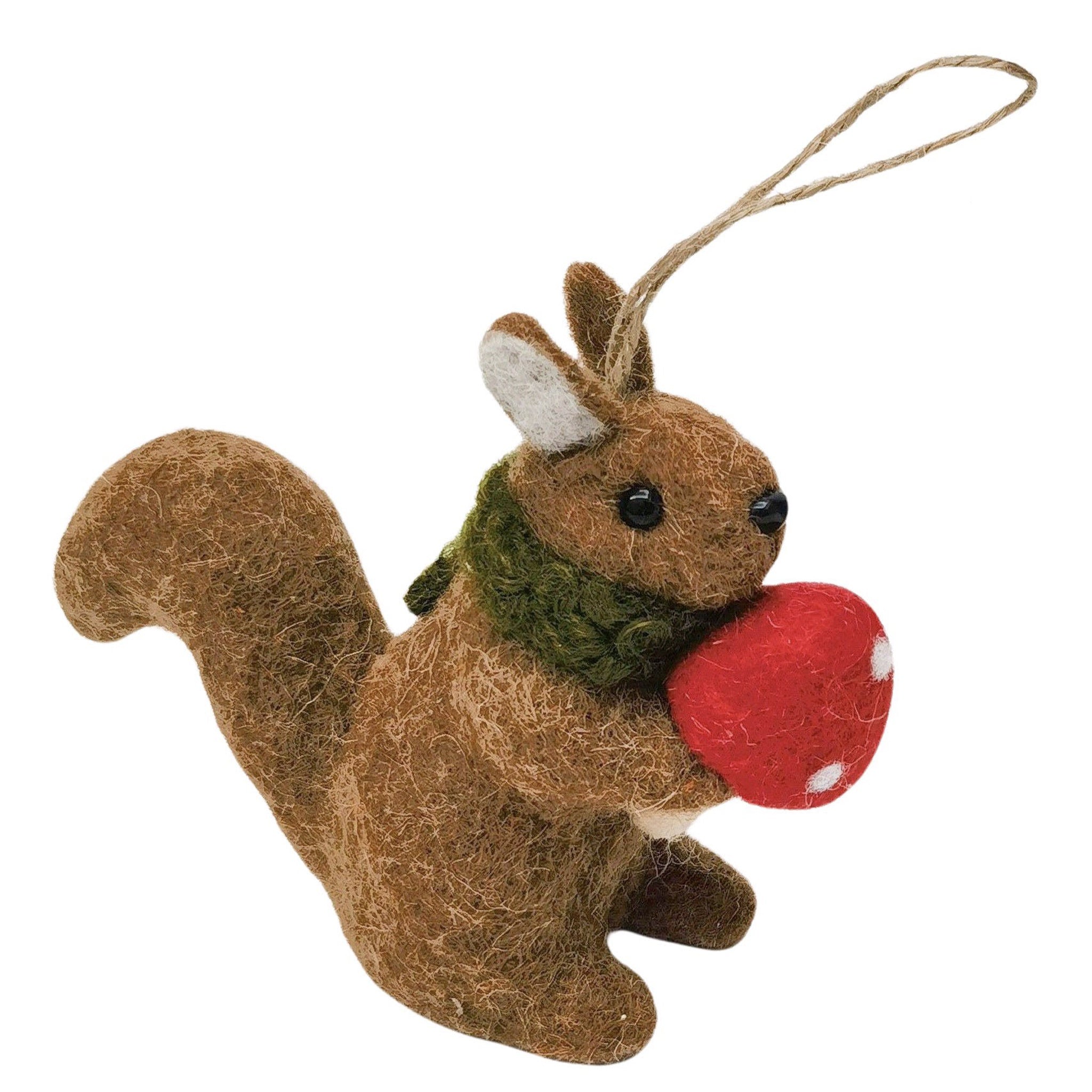 Felt squirrel ornament with a red nut and green scarf on a white background