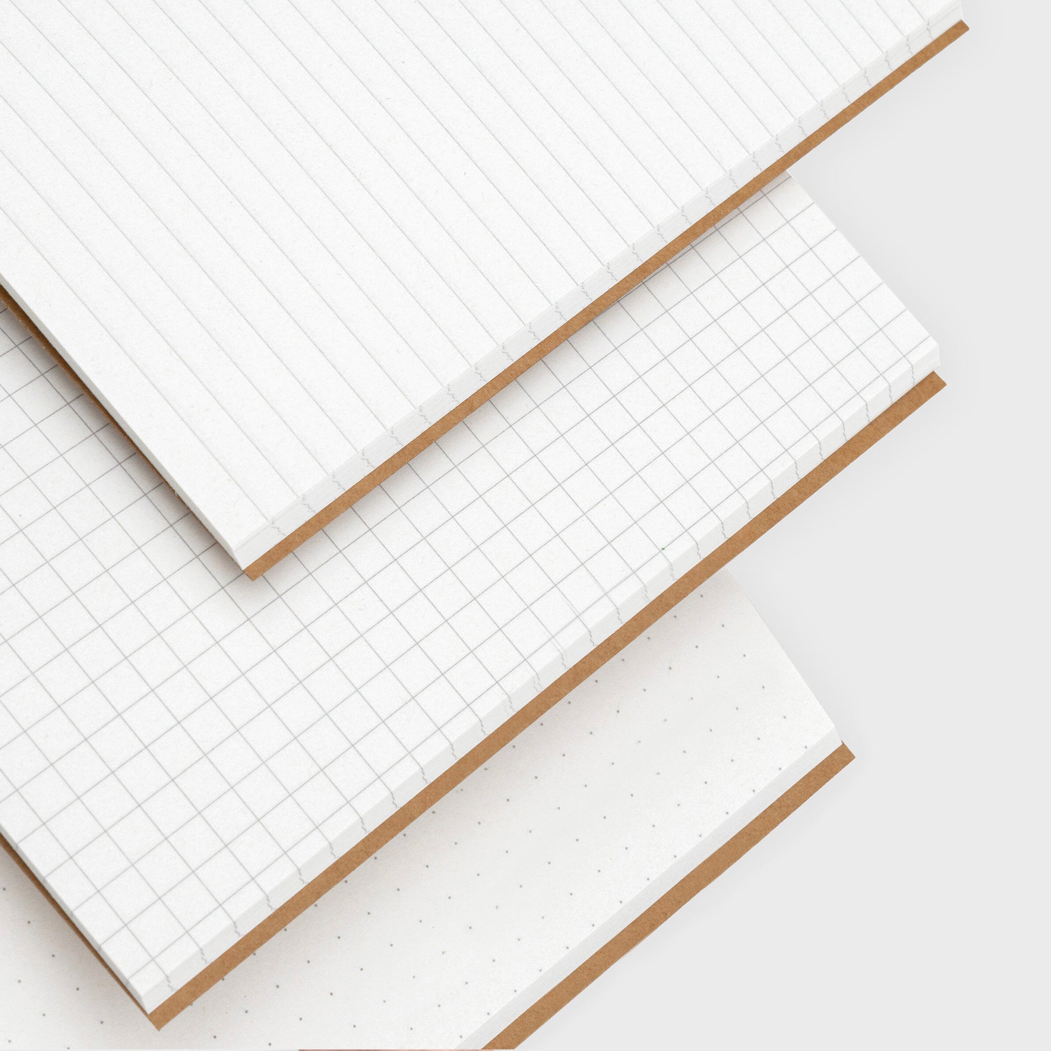 Lined, grid and dots notebook pages.