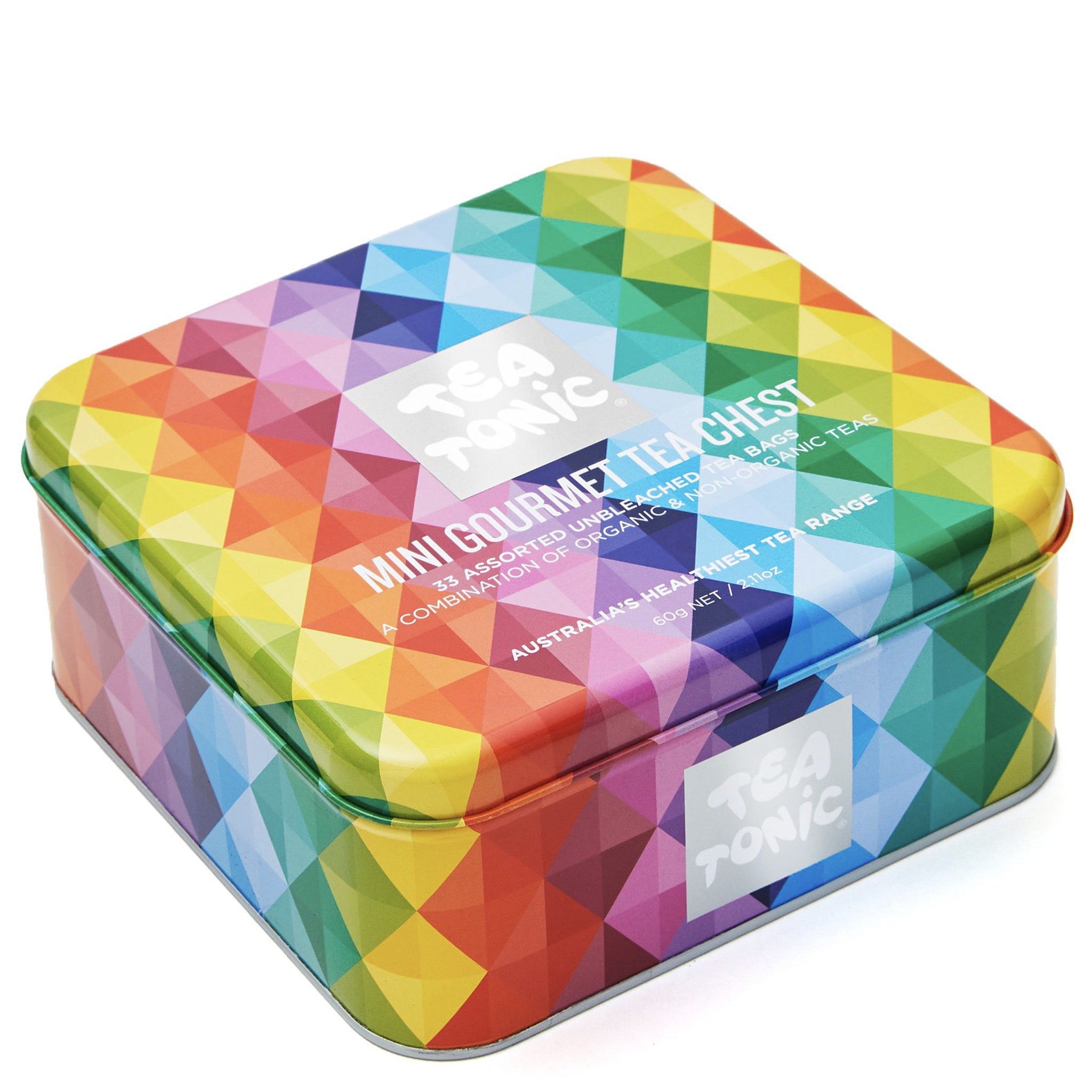 Colorful geometric-patterned tea tin with 'Tea Tonic' branding on a white background
