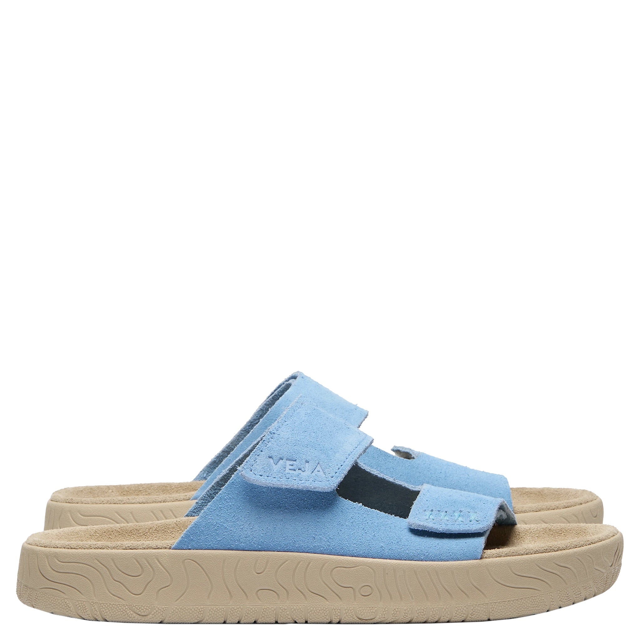 Blue sandal with a beige sole on a white background