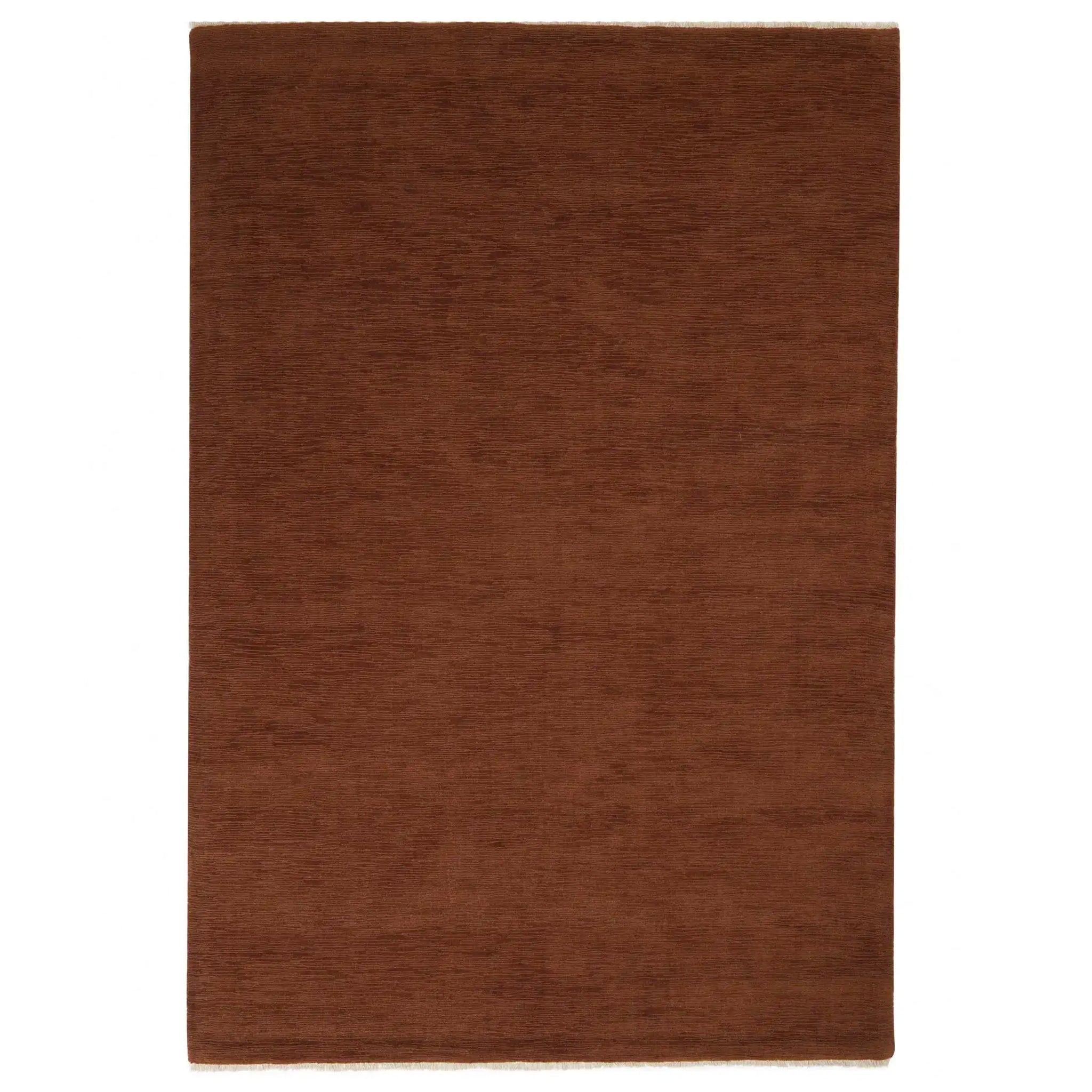 Brown rectangular rug on a white background