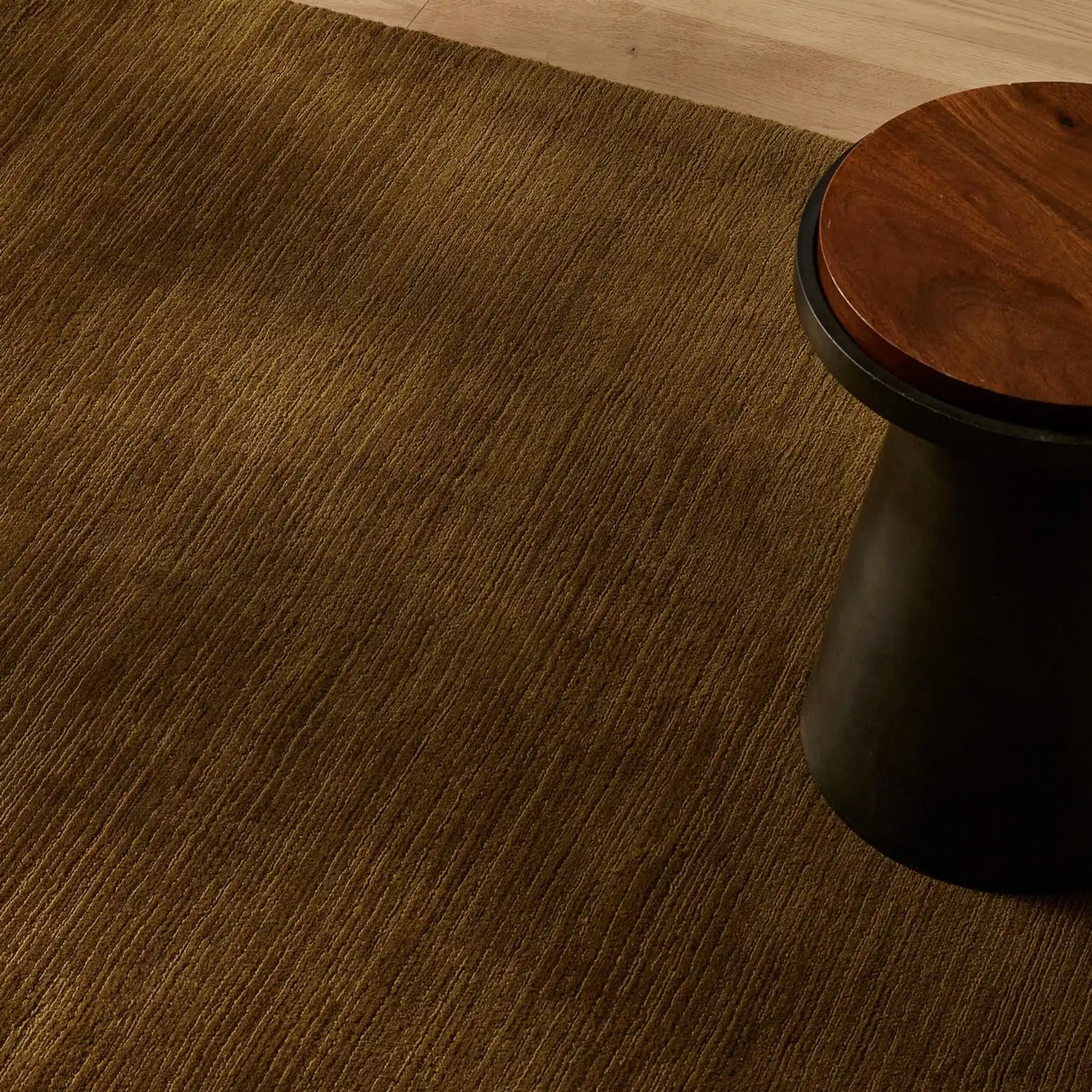 Wooden stool on a wooden floor