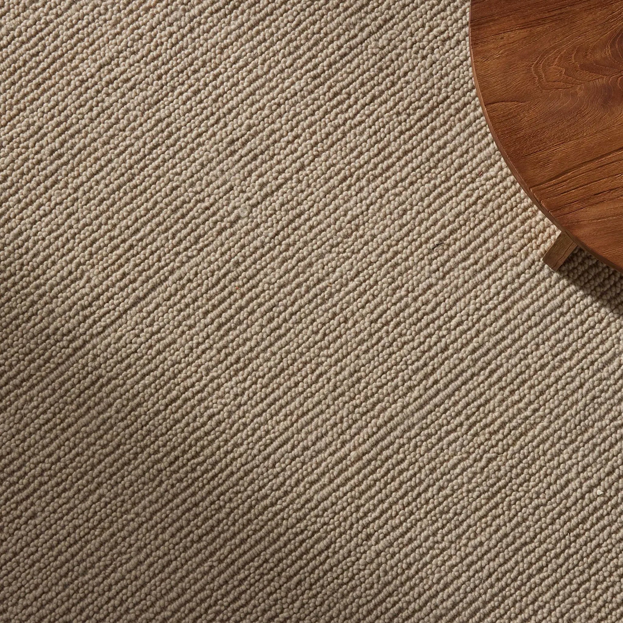 Beige rug with a subtle pattern
