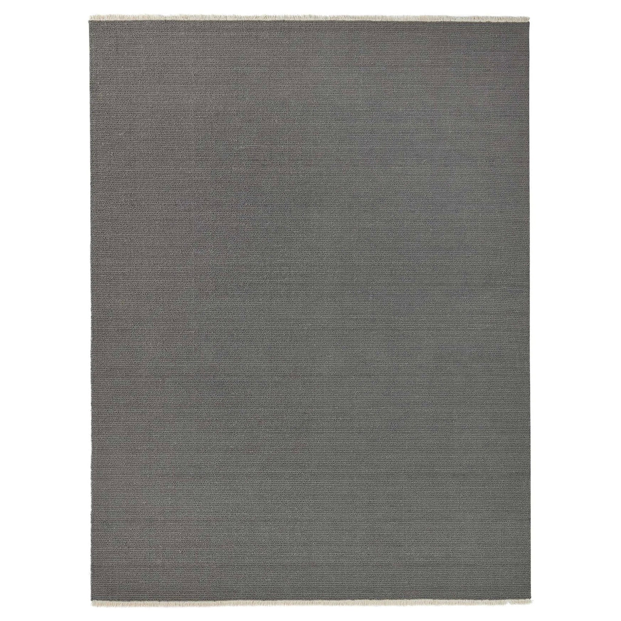 Gray rectangular rug on a white background