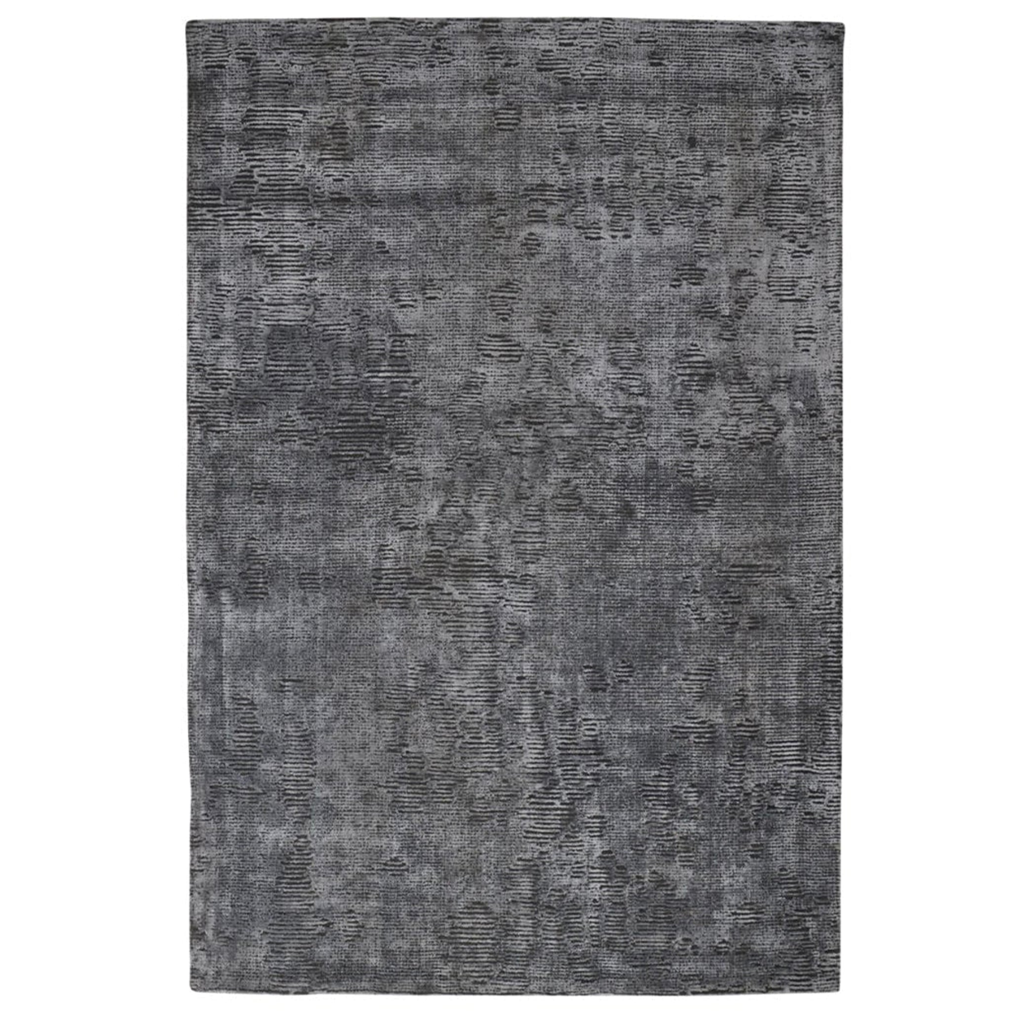 Gray textured area rug on a white background