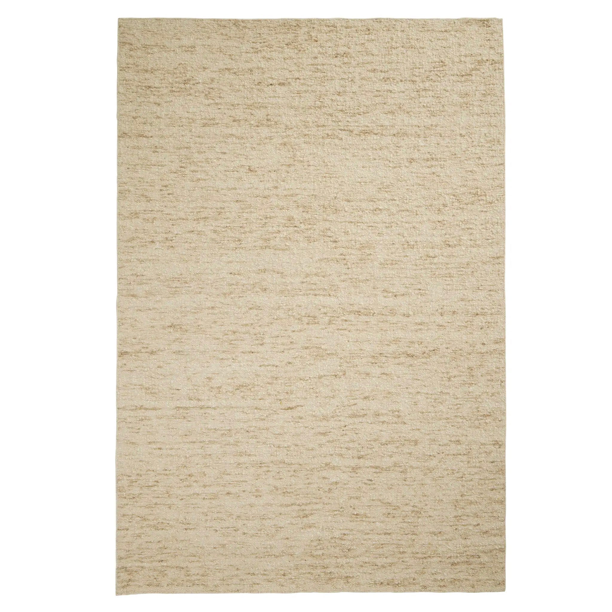 Beige area rug on a white background