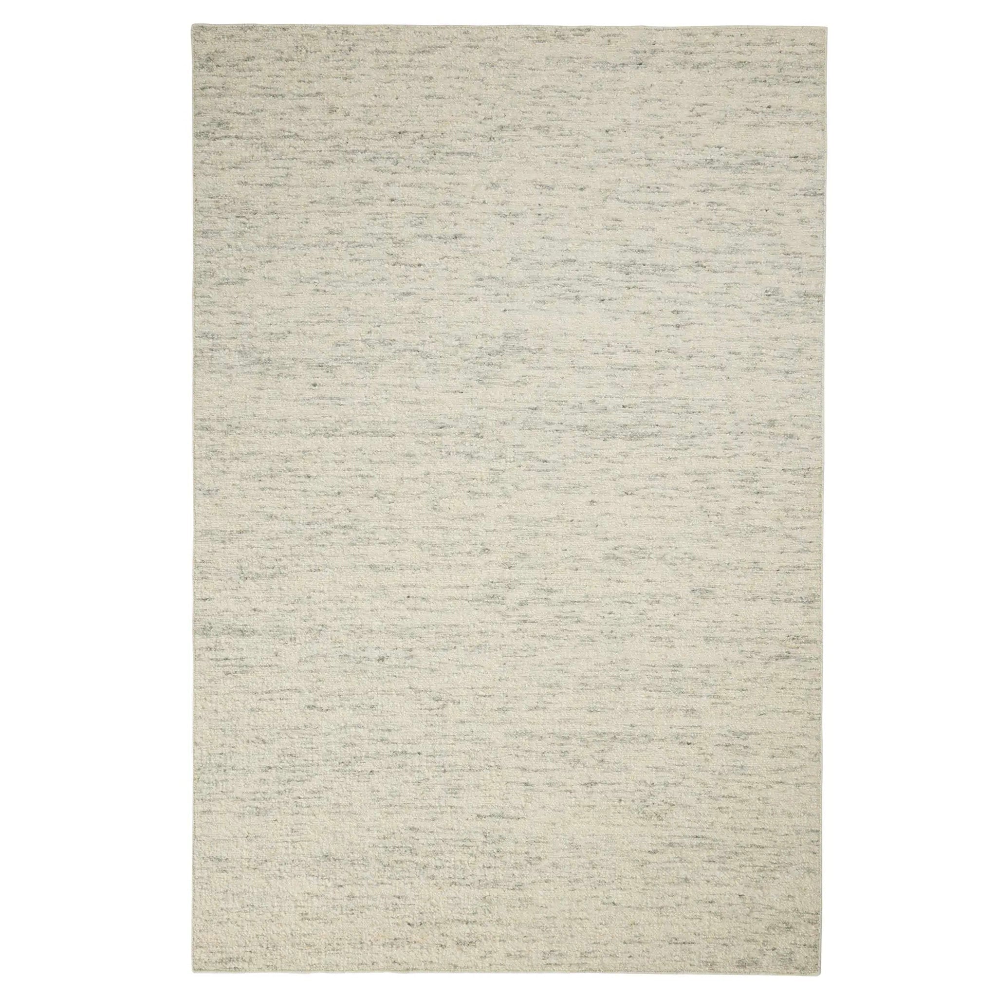 Beige area rug on a white background