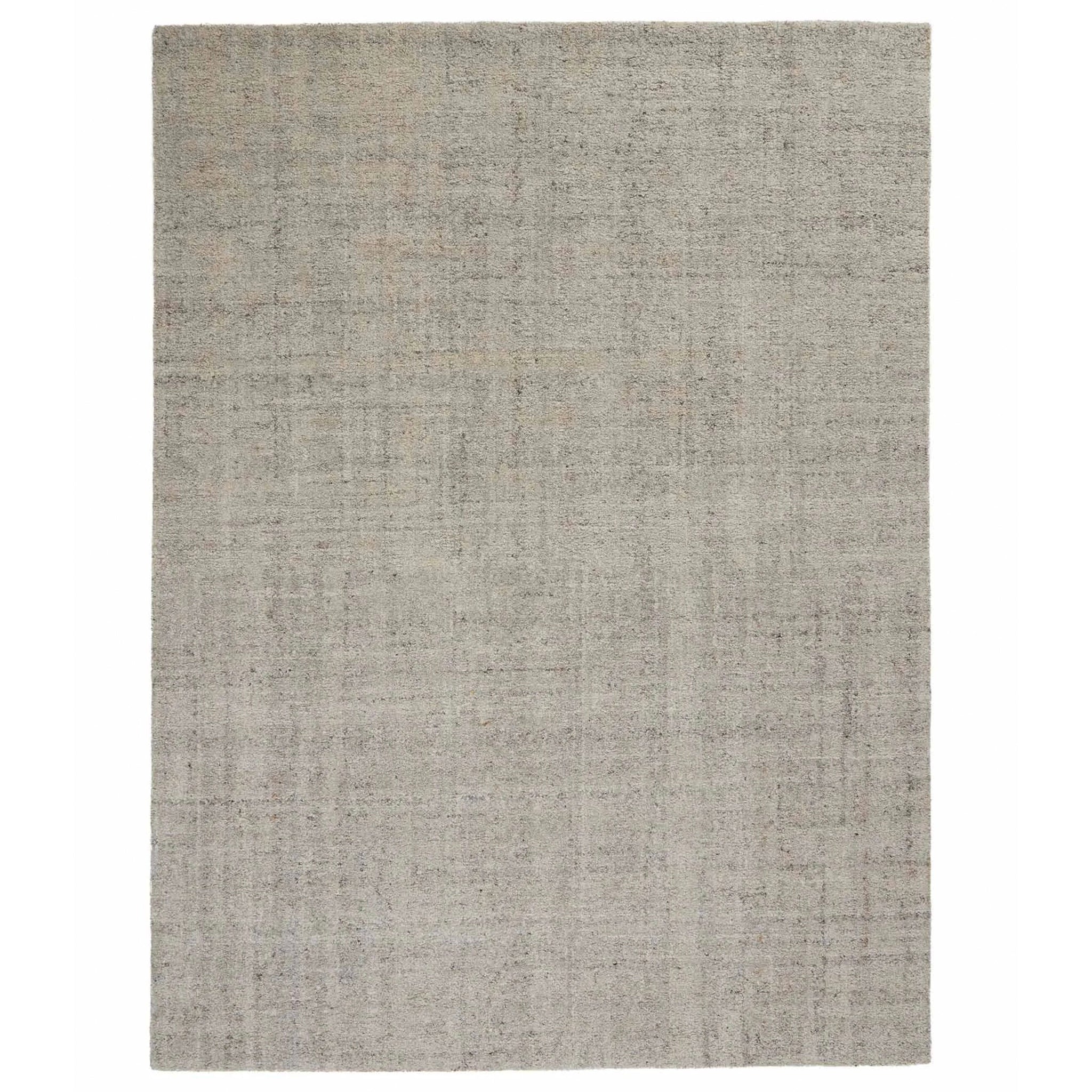 Textured gray rug on a white background