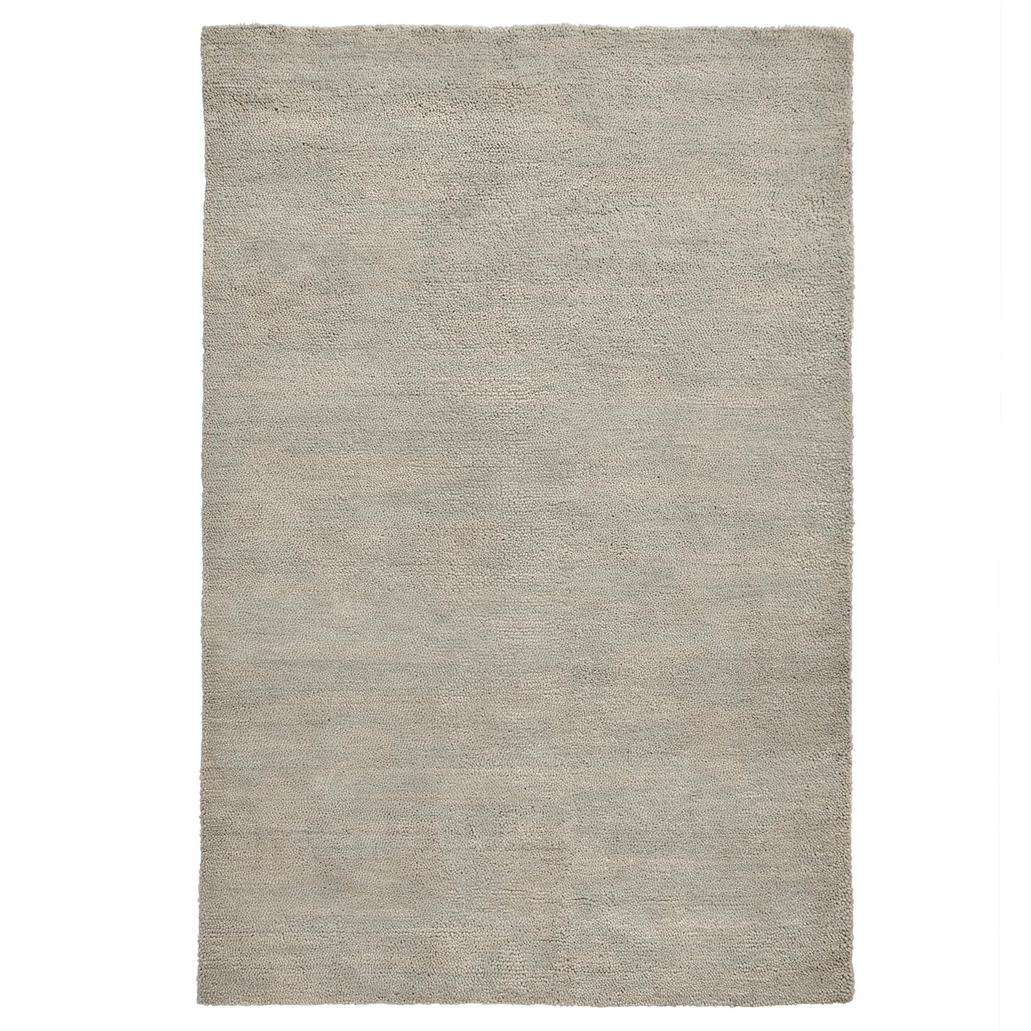 Gray area rug on a white background