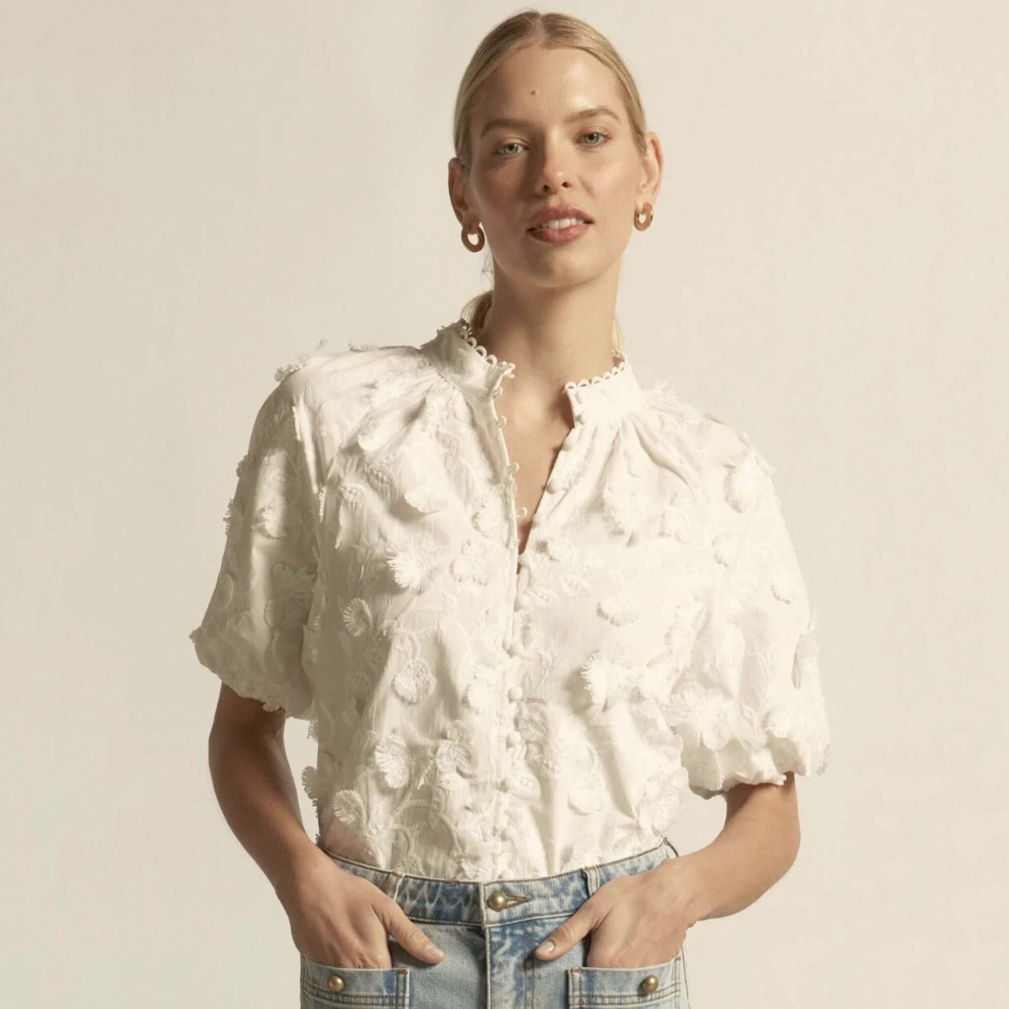 Alt Tag: Zoe Kratzmann Solstice Top - Porcelain 3D floral broderie blouse with high neck, scalloped lace trim and elbow-length blouson sleeves