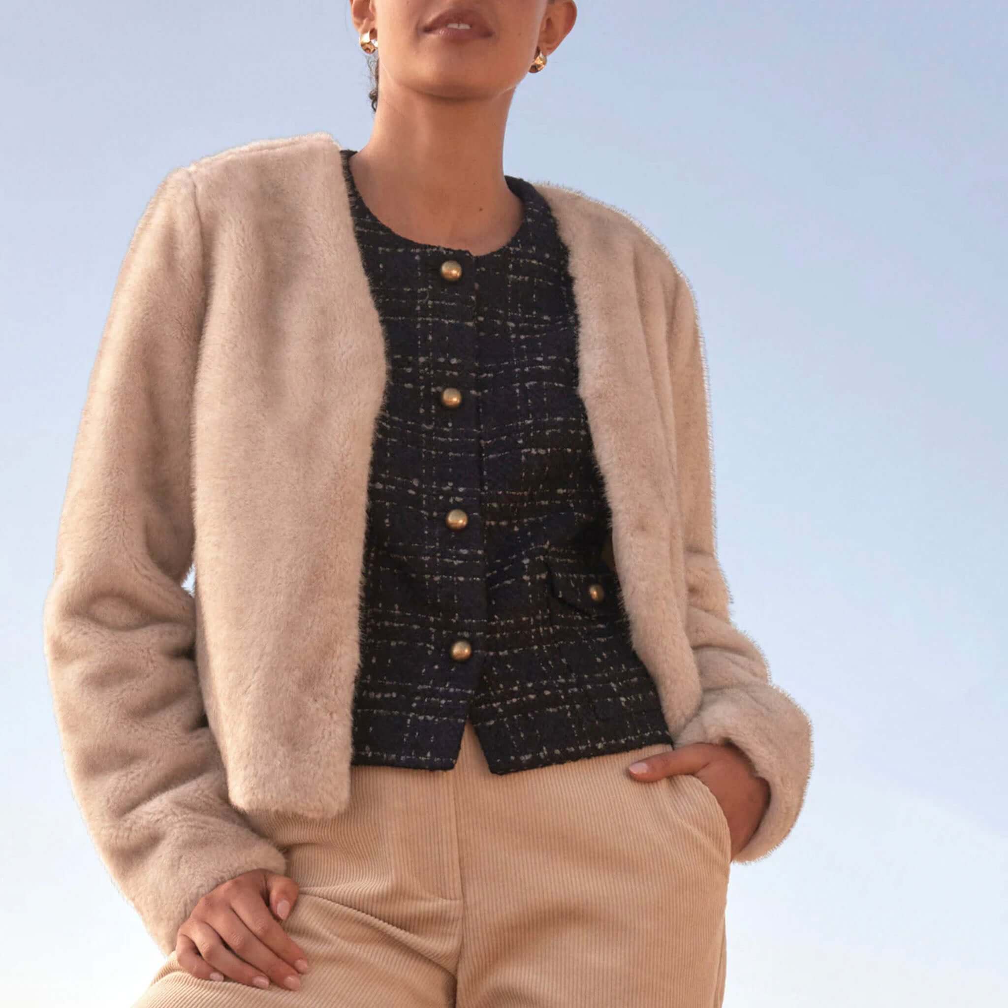 Alt Tag: Zoe Kratzmann Dune Jacket - Ecru plush faux fur cropped V-neck jacket layered over tweed top, winter outfit