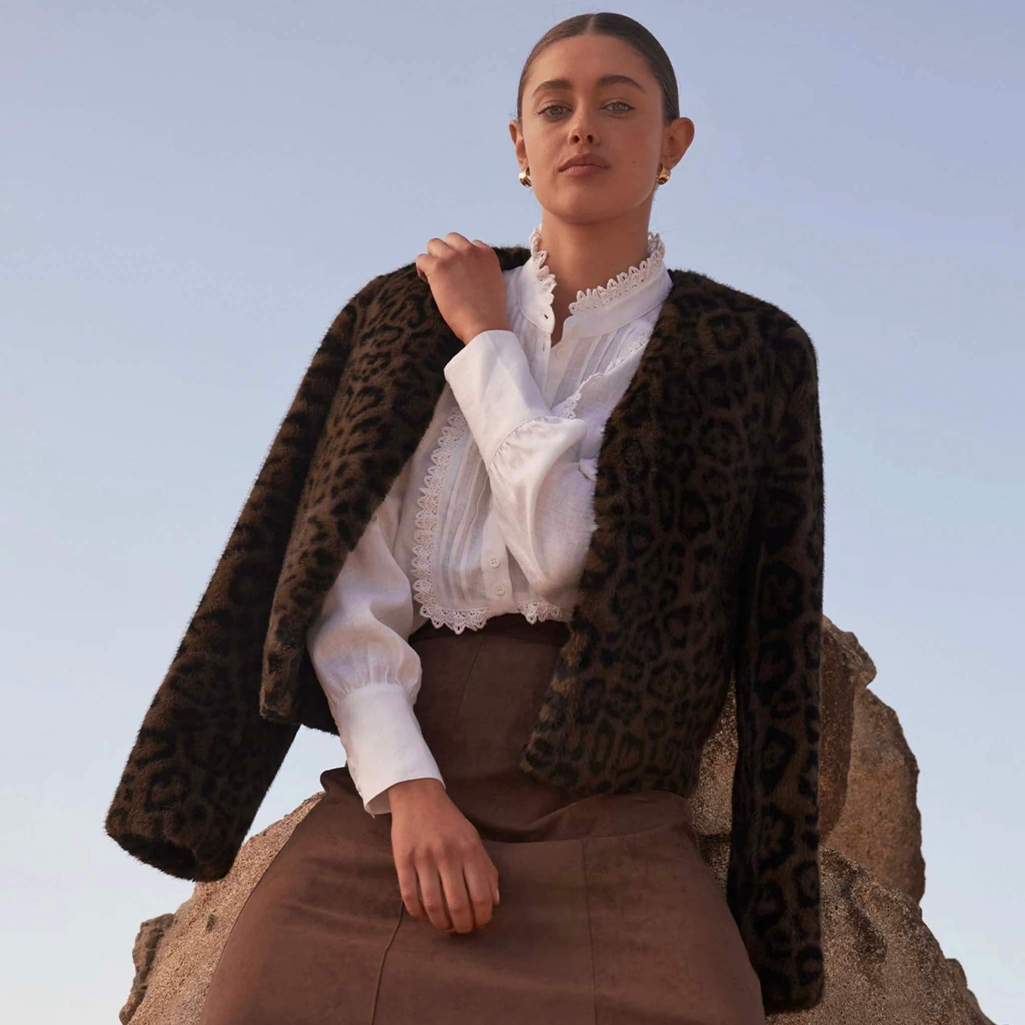 Zoe Kratzmann Dune Jacket - Ocelot faux fur cropped jacket in leopard print, styled over white blouse