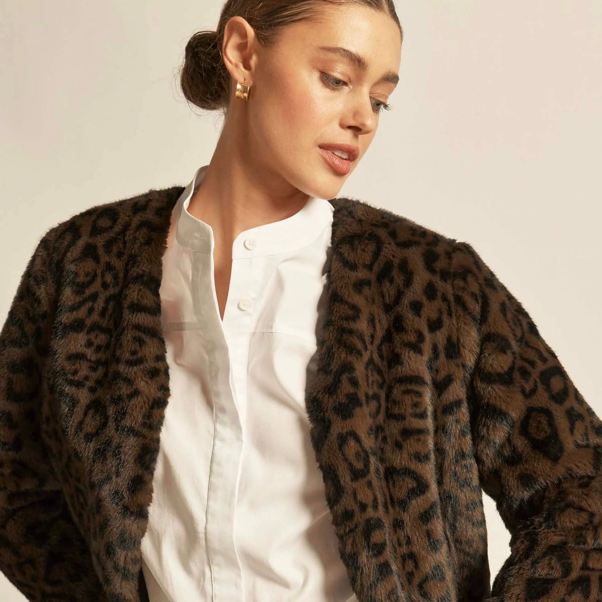 Alt Tag: Zoe Kratzmann Dune Jacket - Ocelot plush faux fur ocelot print cropped V-neck jacket styled over white blouse