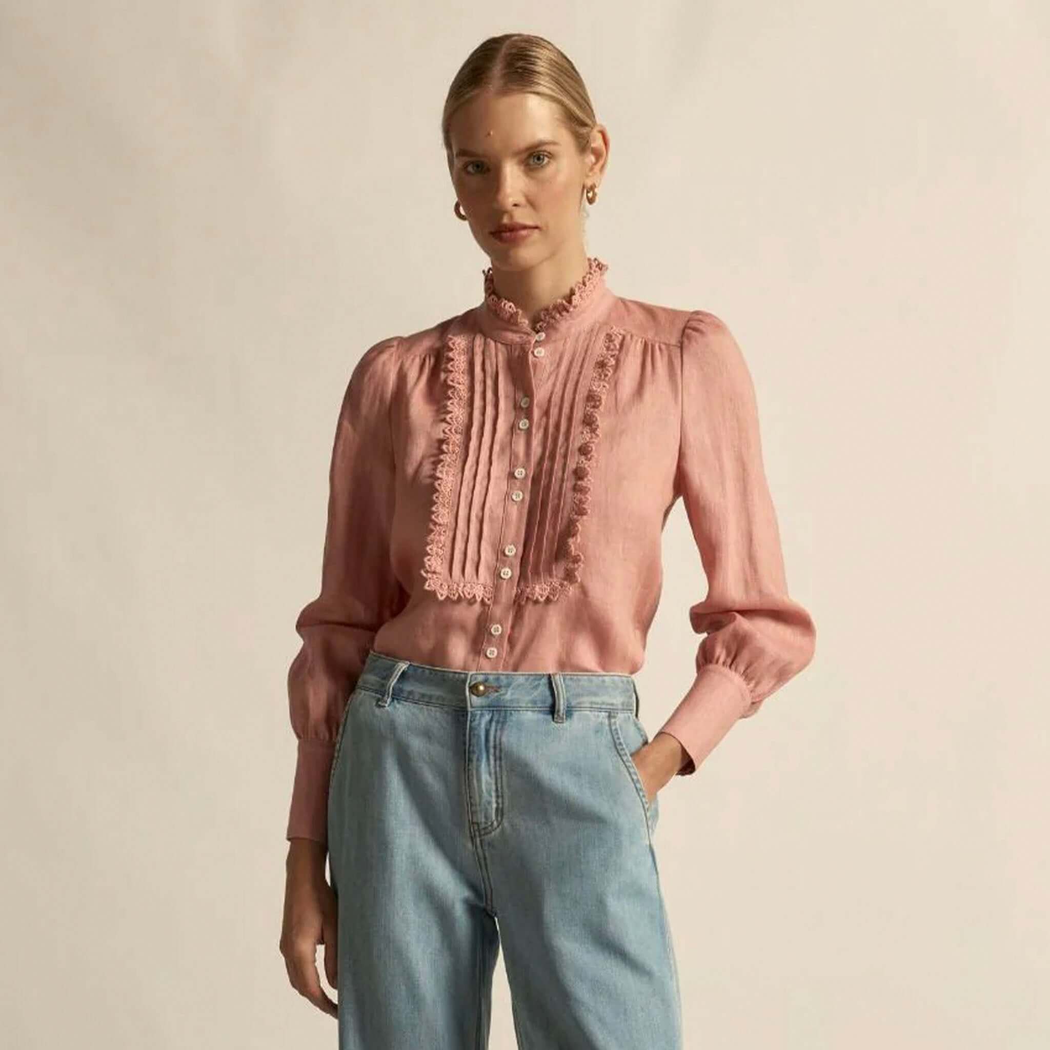 Alt Tag: Zoe Kratzmann Haze Top - Camellia pink linen blouse with lace-trim bib and button-through front, styled with denim jeans