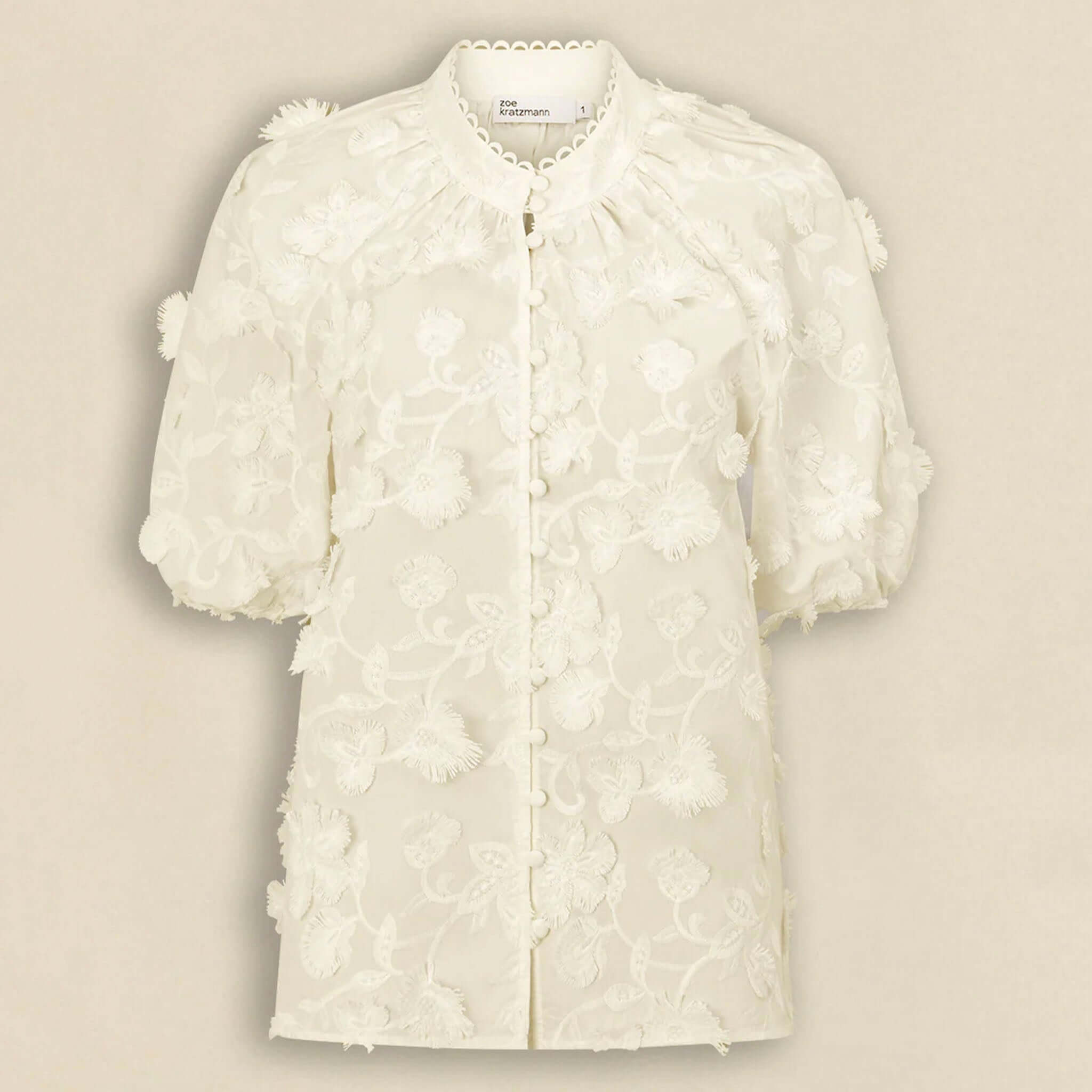 Alt Tag: Zoe Kratzmann Solstice Top - Porcelain 3D floral broderie blouse with scalloped lace trim, high neck and elbow-length sleeves