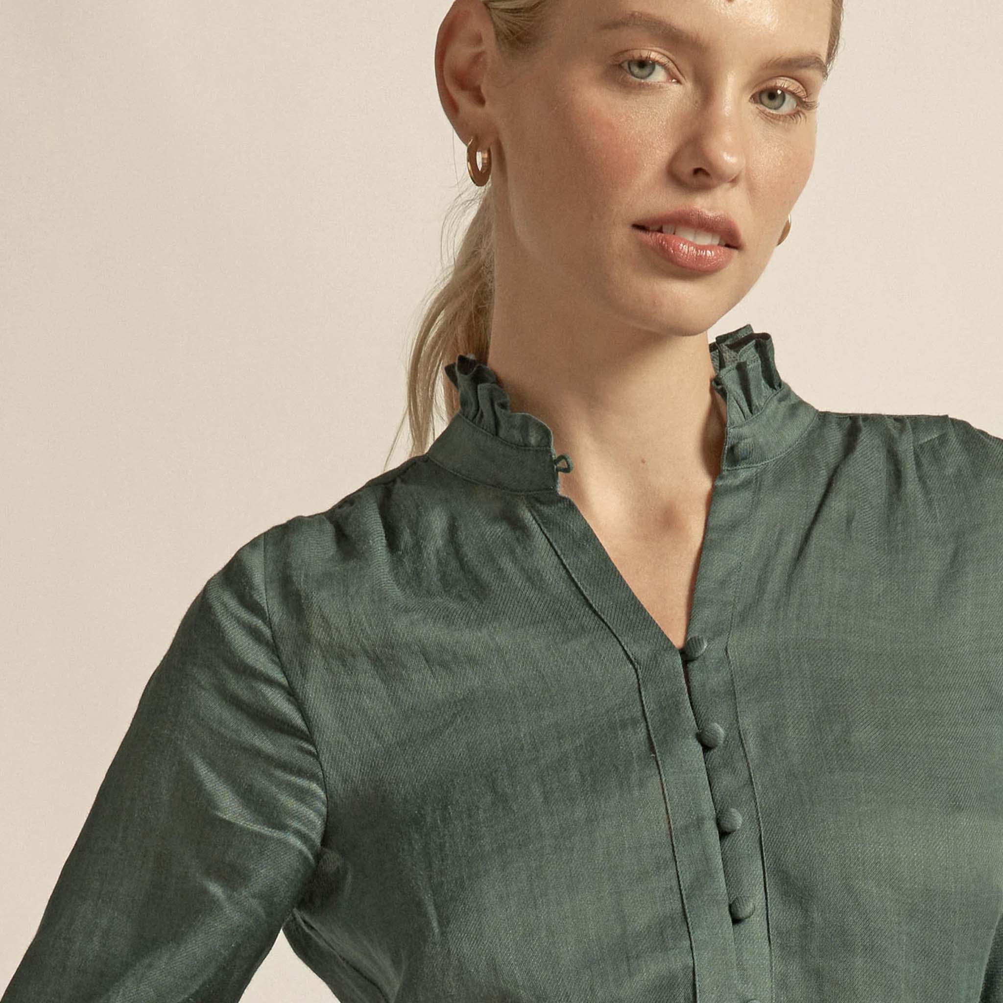 Zoe Kratzmann Stir Top - Grove green ramie blouse with ruffle-trim neckline, v-neck and button front