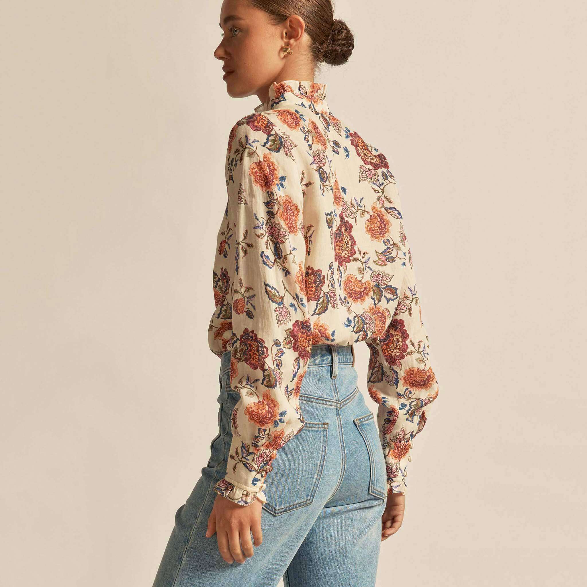 Alt Tag: Zoe Kratzmann Stir Top - Heirloom Bloom vintage floral ramie blouse, ruffle trim, back view styled with high-waist jeans
