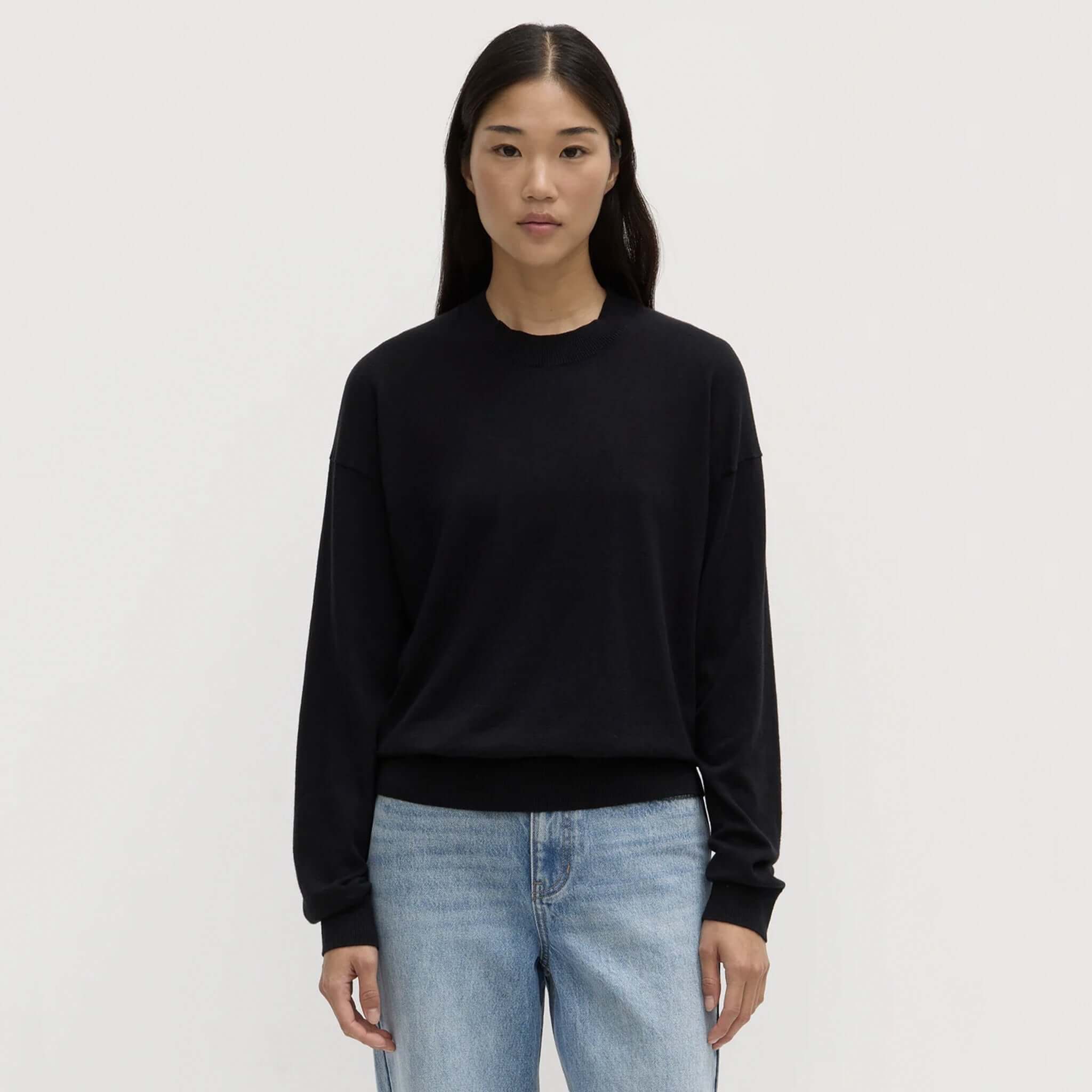 Alt Tag: Assembly Label Cotton Cashmere Lounge Sweater - Black on model, ribbed crew neck and cuffs, lightweight layering knit