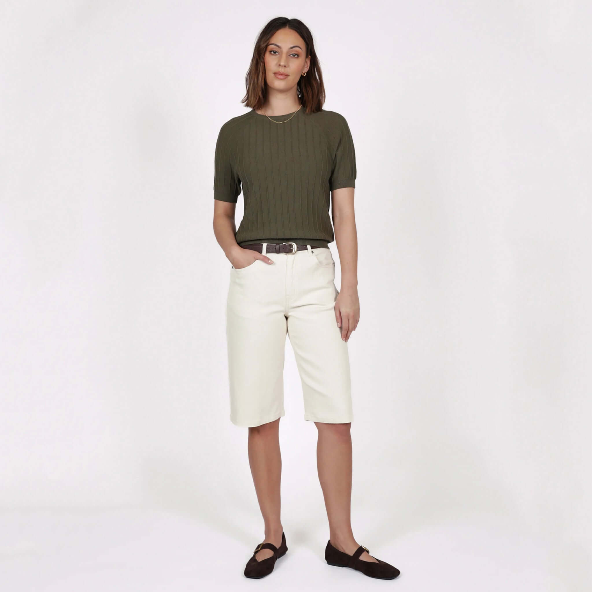 Marlow Soleil Knit Tee - Olive worn with white shorts and a brown belt, featuring a relaxed fit and ribbed texture.