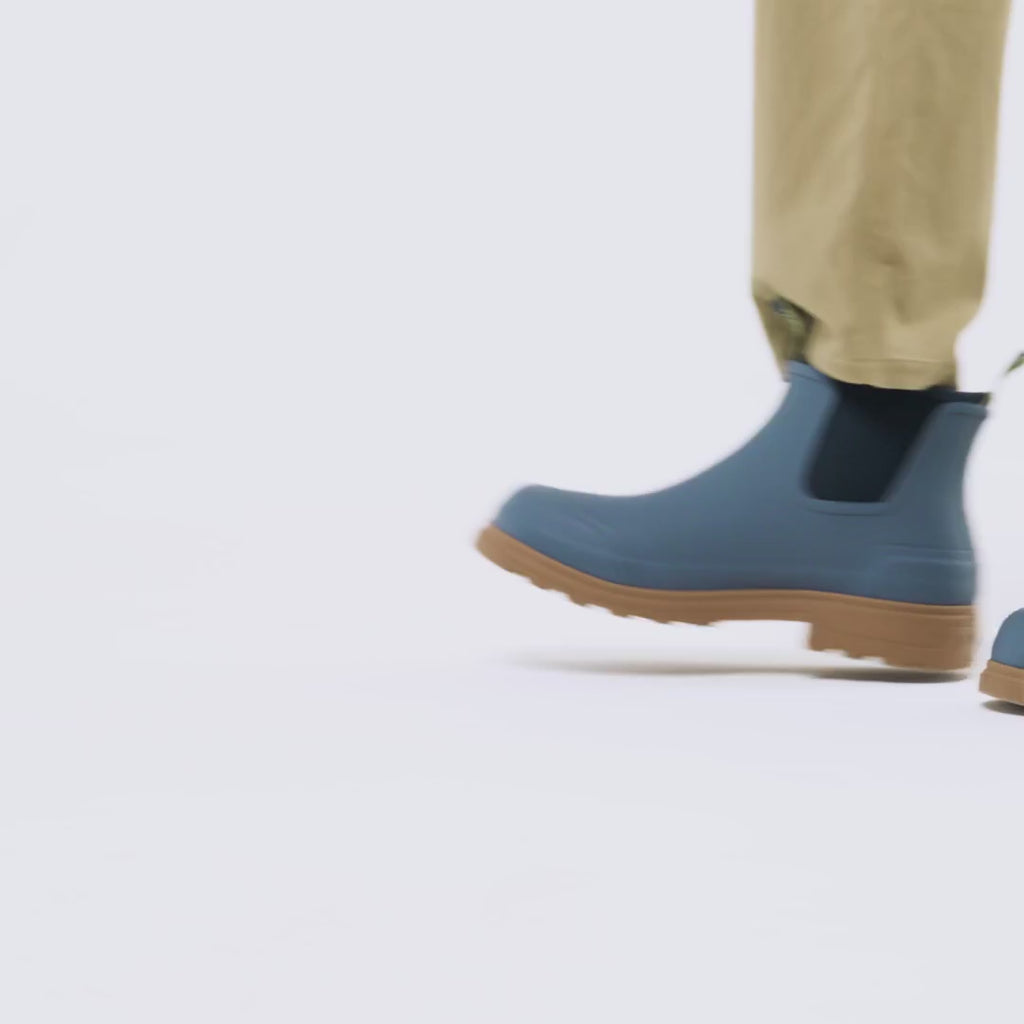 Alt Tag: Merry People Oberon Boots - Storm Blue unisex wide-fit 100% waterproof natural rubber ankle boots in motion