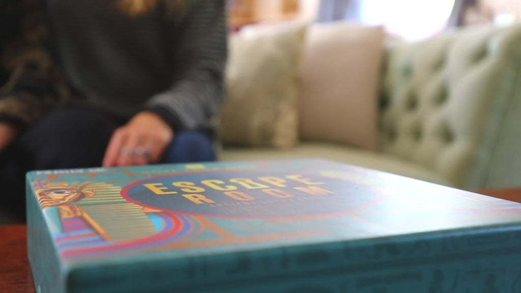 Escape room game with Egyptian-themed design and text.