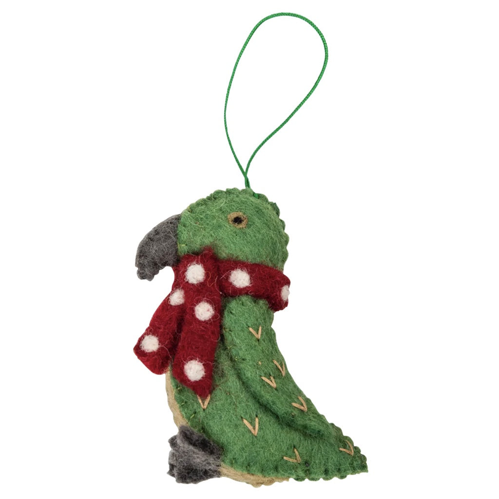 A handcrafted felt Christmas decoration depicting a green Kea with a red scarf and a green hanging loop.