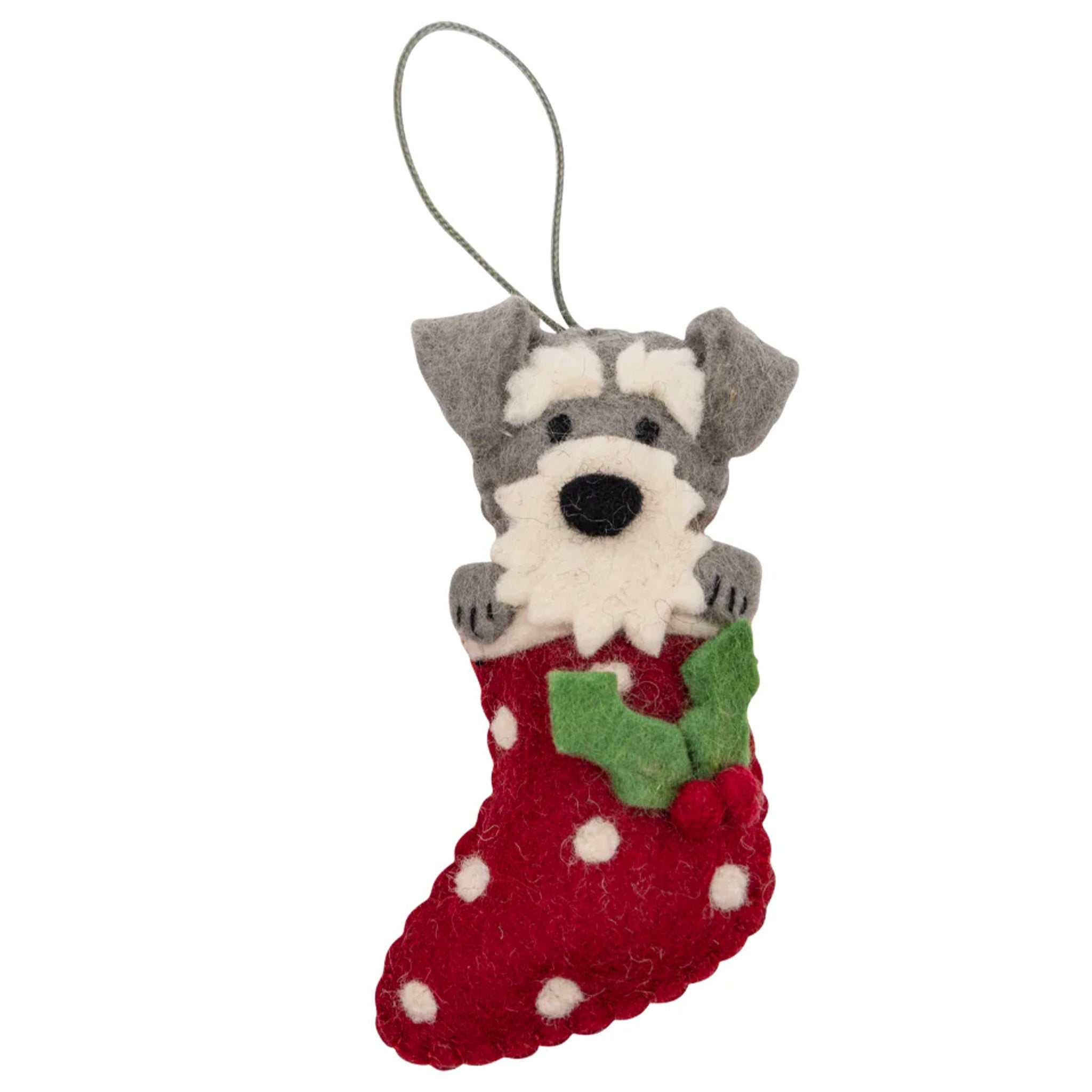 A handcrafted felt Christmas decoration featuring a Schnauzer dog in a red stocking with green polka dots.